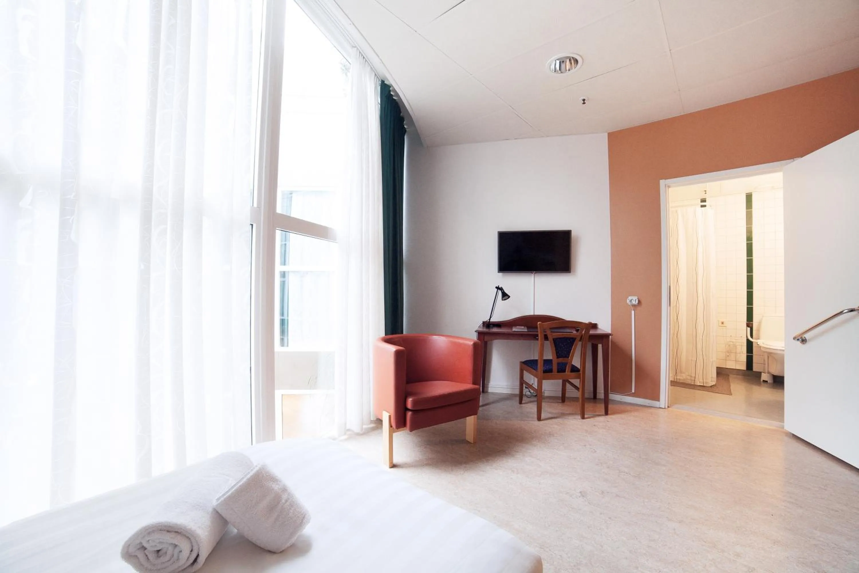 Seating area, Bed in Pronova Hotell & Vandrarhem