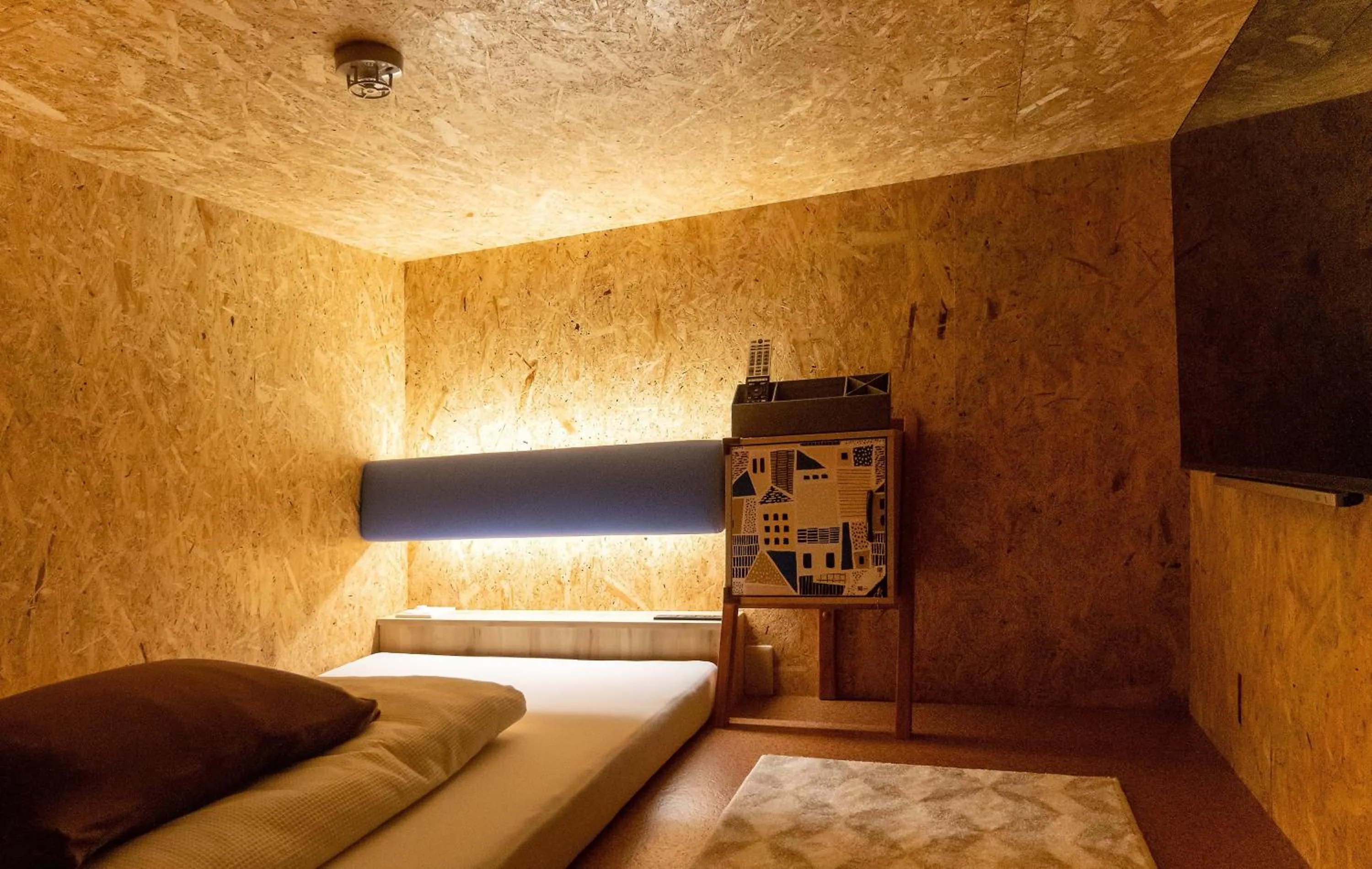 Bed in eeGee STAY Kamata