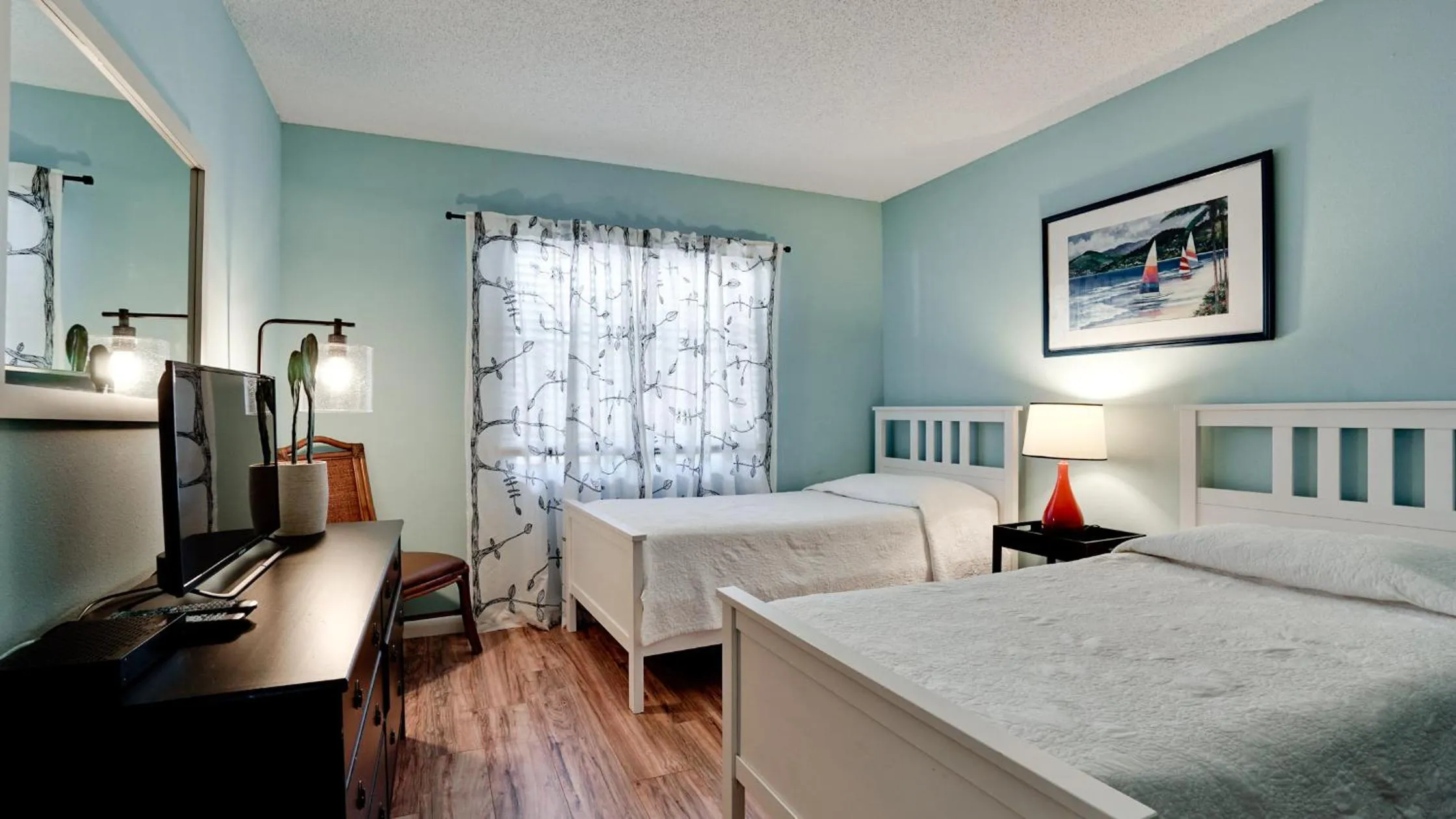 Bed in Shorewalk Vacation Villa