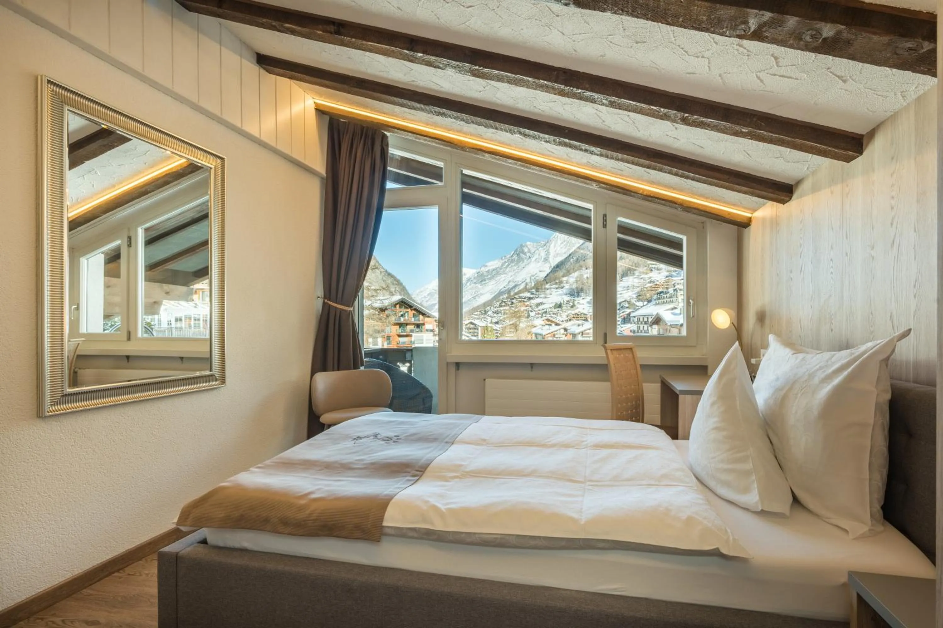 Bed in Hotel Beau Rivage