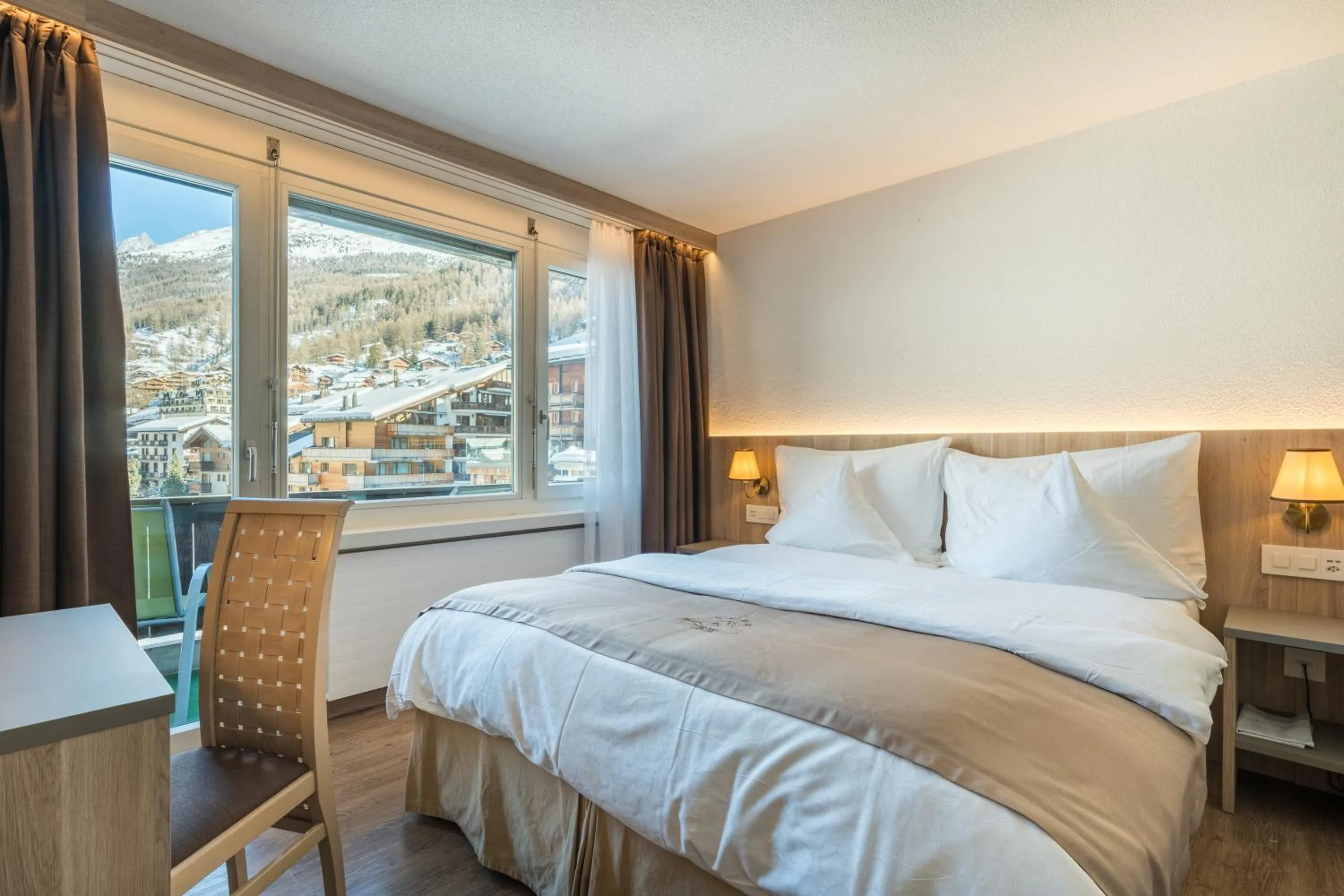 Bed in Hotel Beau Rivage