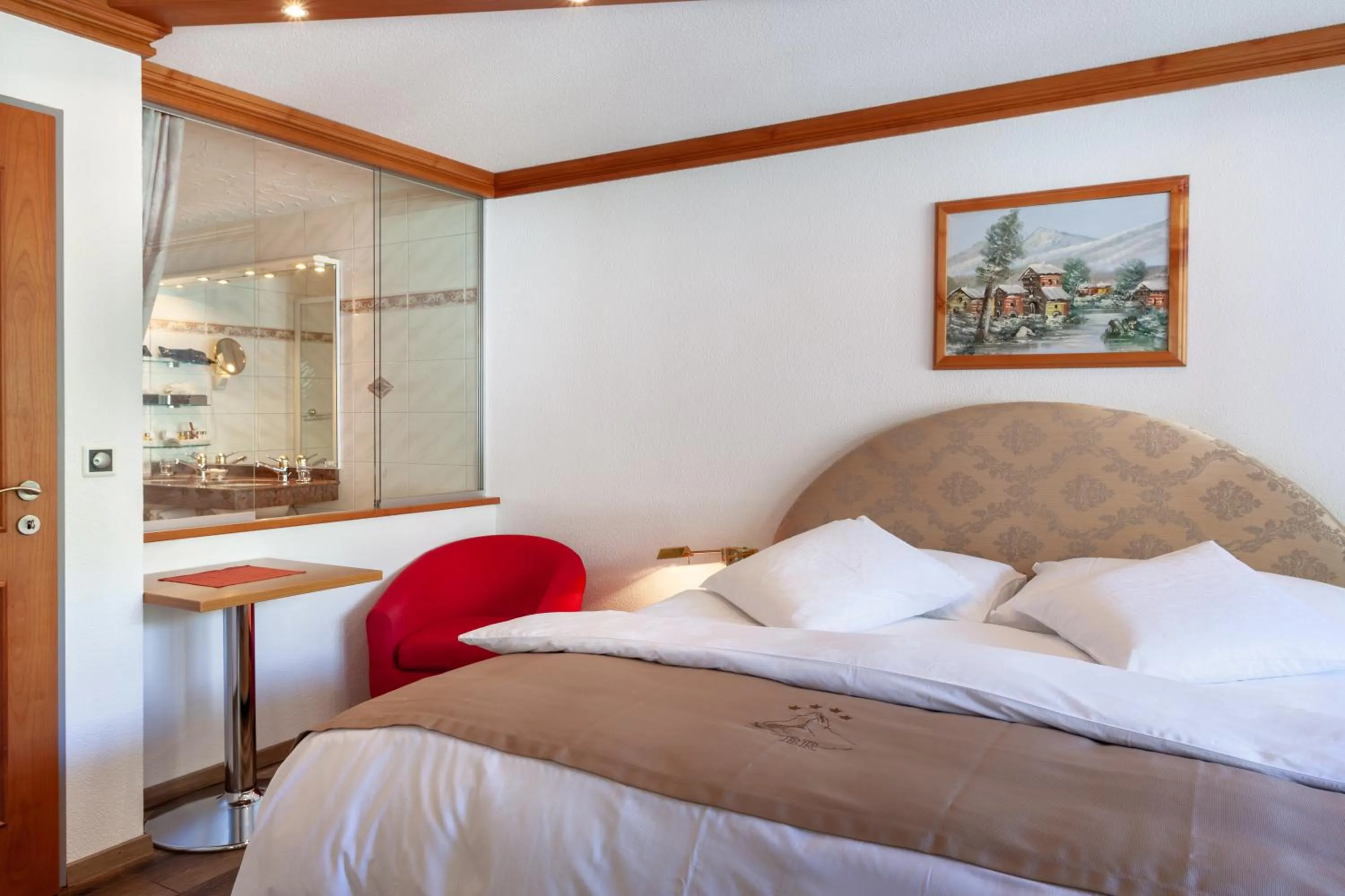 Bed in Hotel Beau Rivage