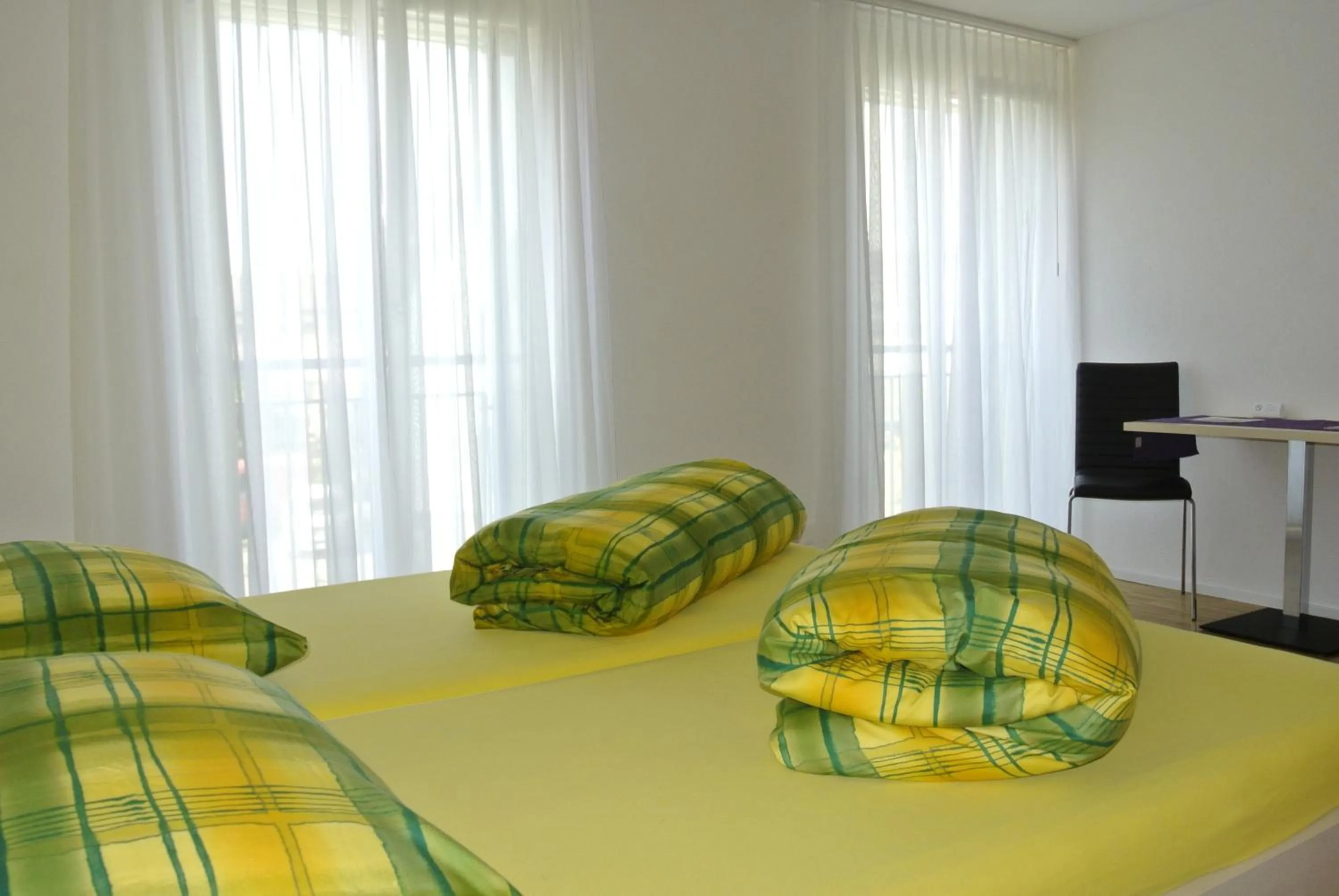 Photo of the whole room, Bed in Hotel Garni Bären Bazenheid