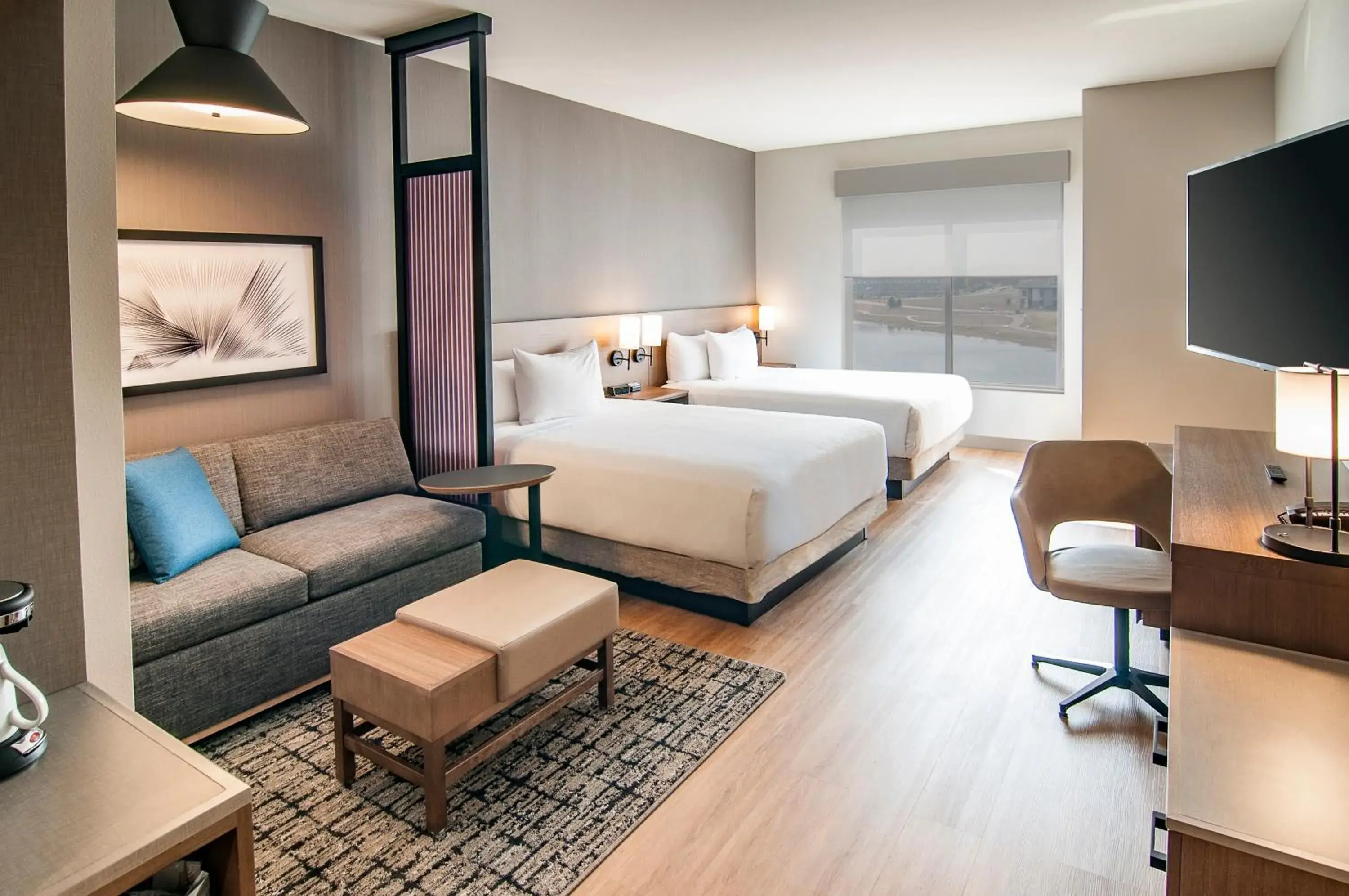 Specialty Queen Room with Two Queen Beds and Sofa Bed - Lake View in Hyatt Place Sioux Falls South Specialty Queen Room with Two Queen Beds and Sofa Bed - Lake View in Hyatt Place Sioux Falls South