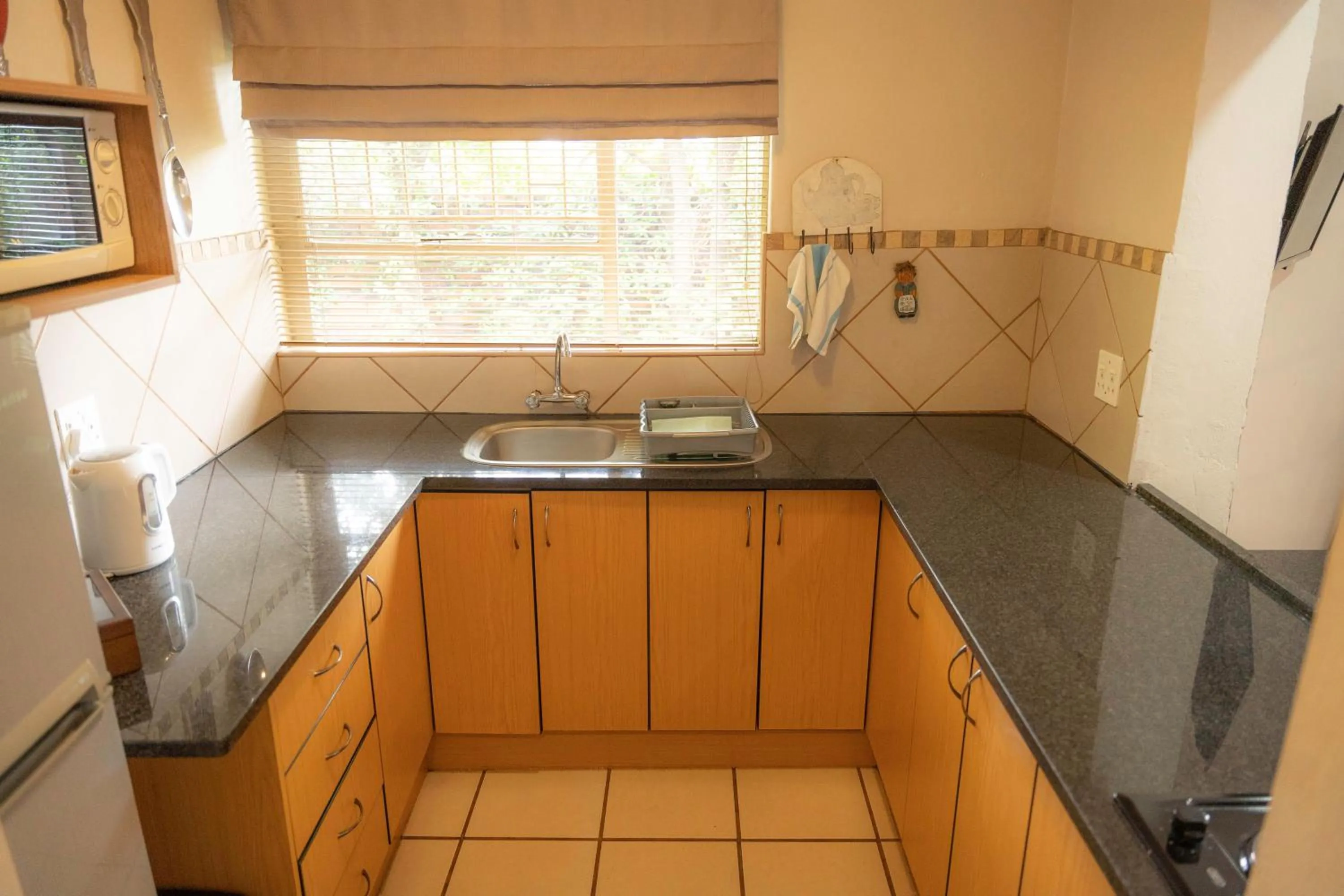 Kitchen or kitchenette in L'anda Guesthouse & self catering