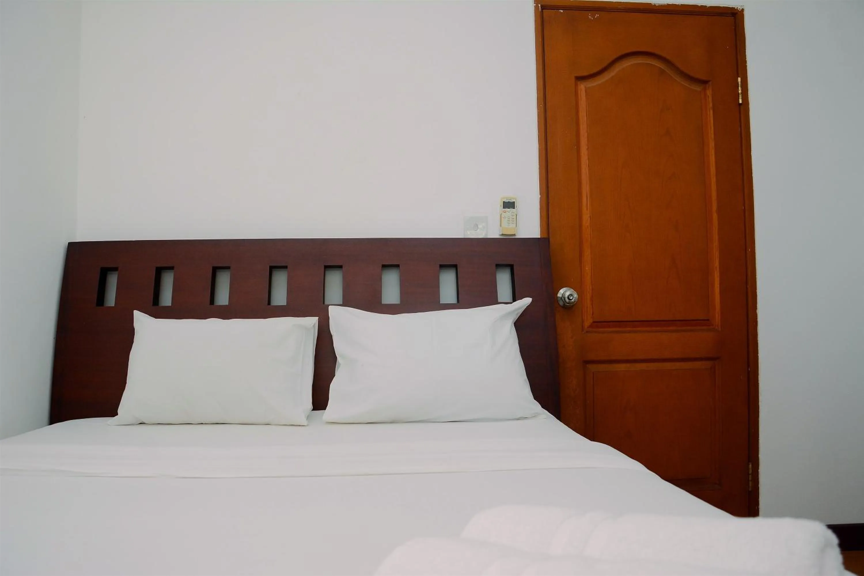 Bed in Comfortable 2BR Apartment at Mediterania Palace Residence By Travelio