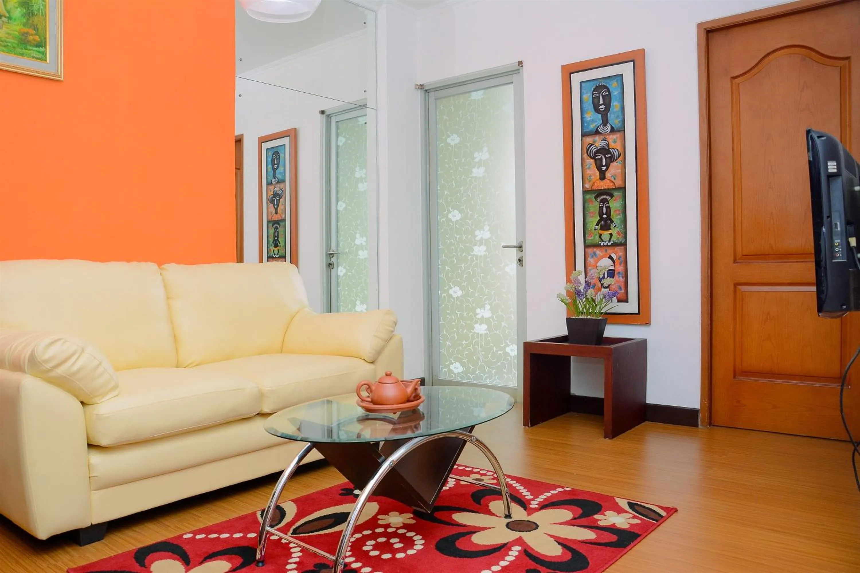 Living room in Comfortable 2BR Apartment at Mediterania Palace Residence By Travelio