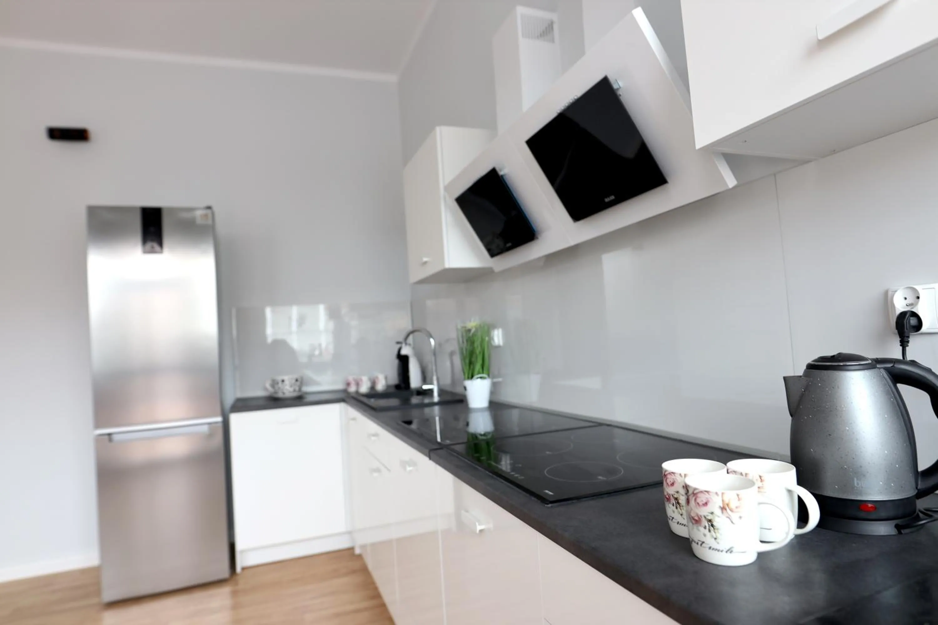 Communal kitchen in Ośrodek Wczasowy Magnat