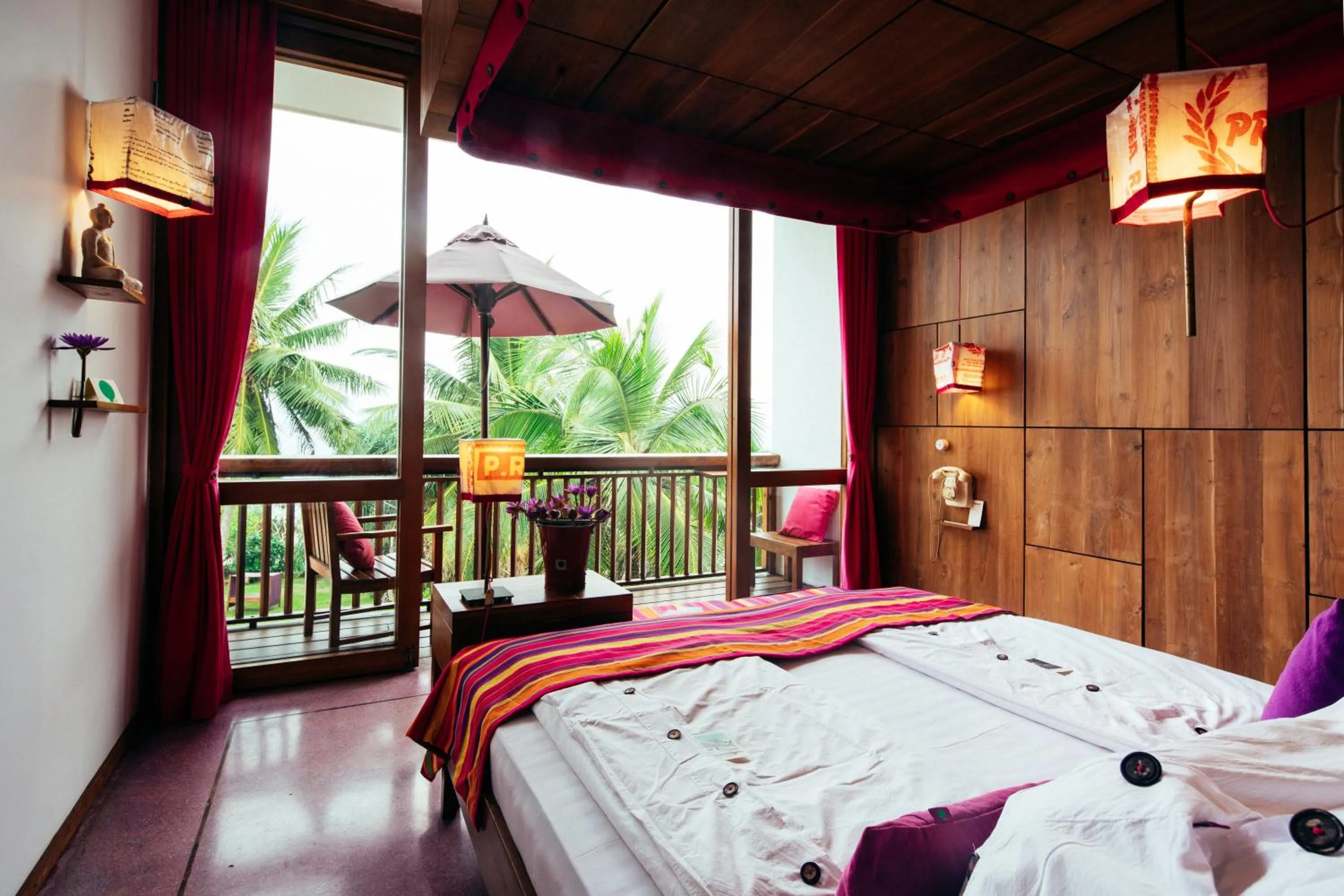 Bed in UTMT - Underneath The Mango Tree Spa & Beach Resort