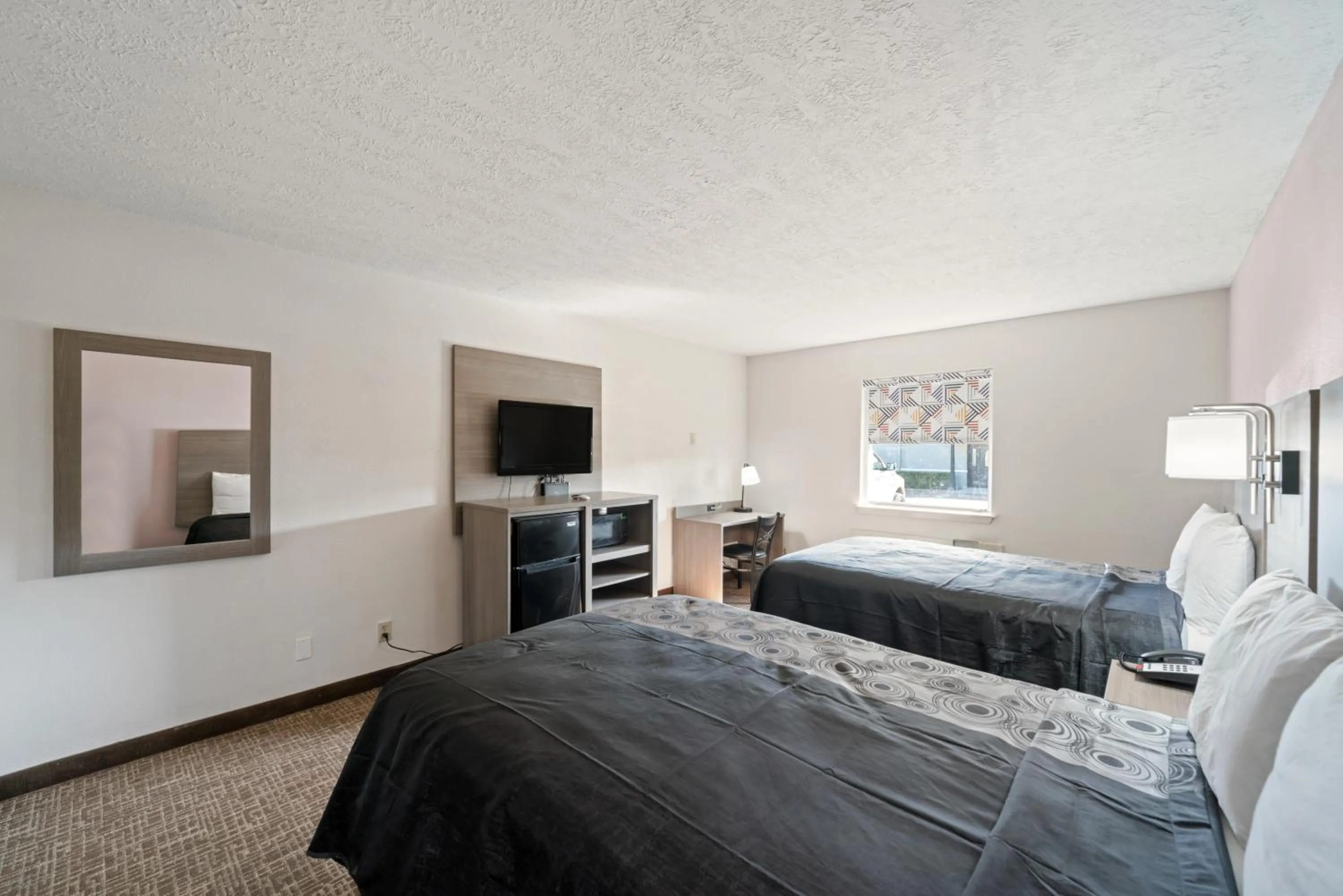 Bed in Americas Best Value Inn & Suites Brenham