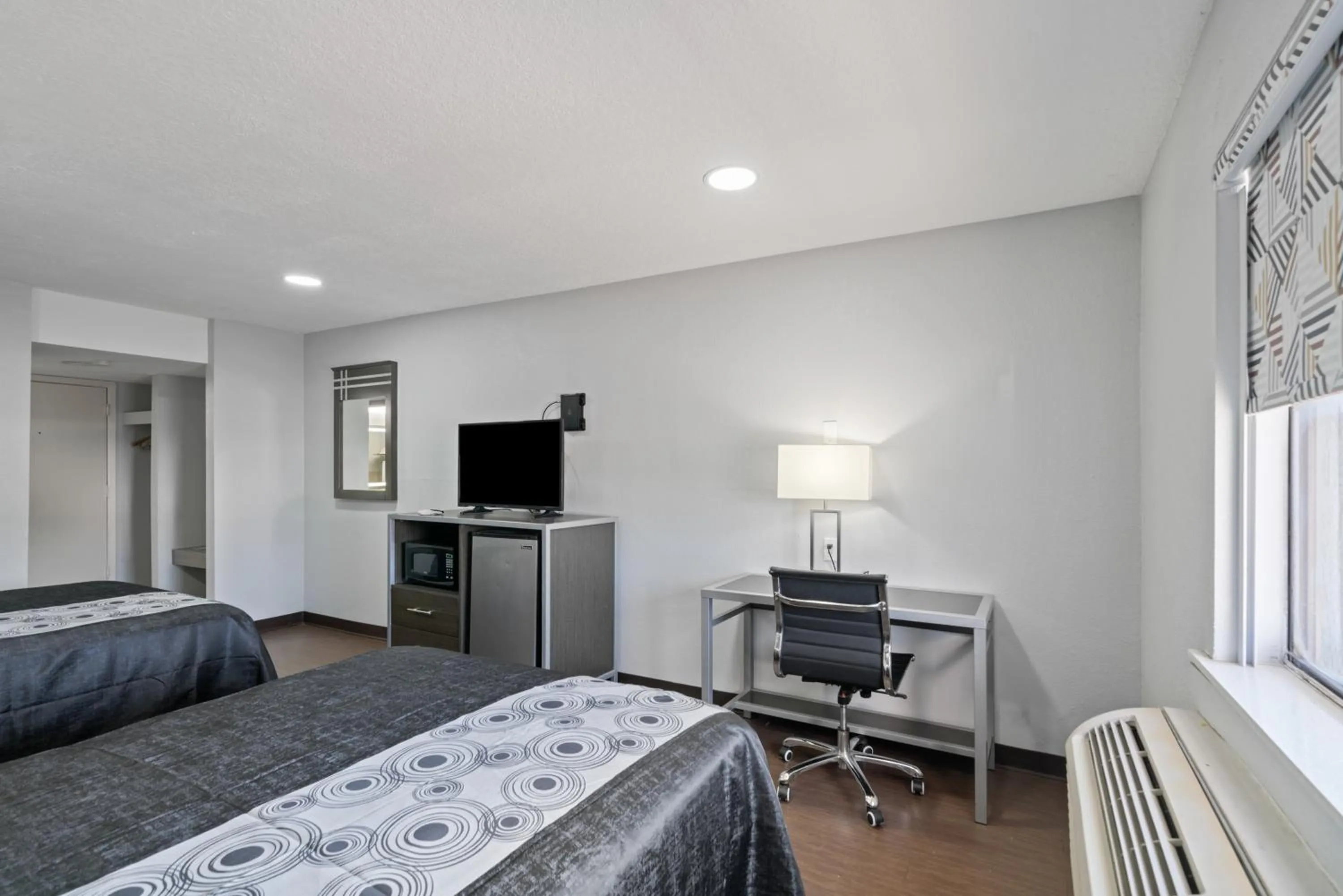 Bed in Americas Best Value Inn & Suites Brenham