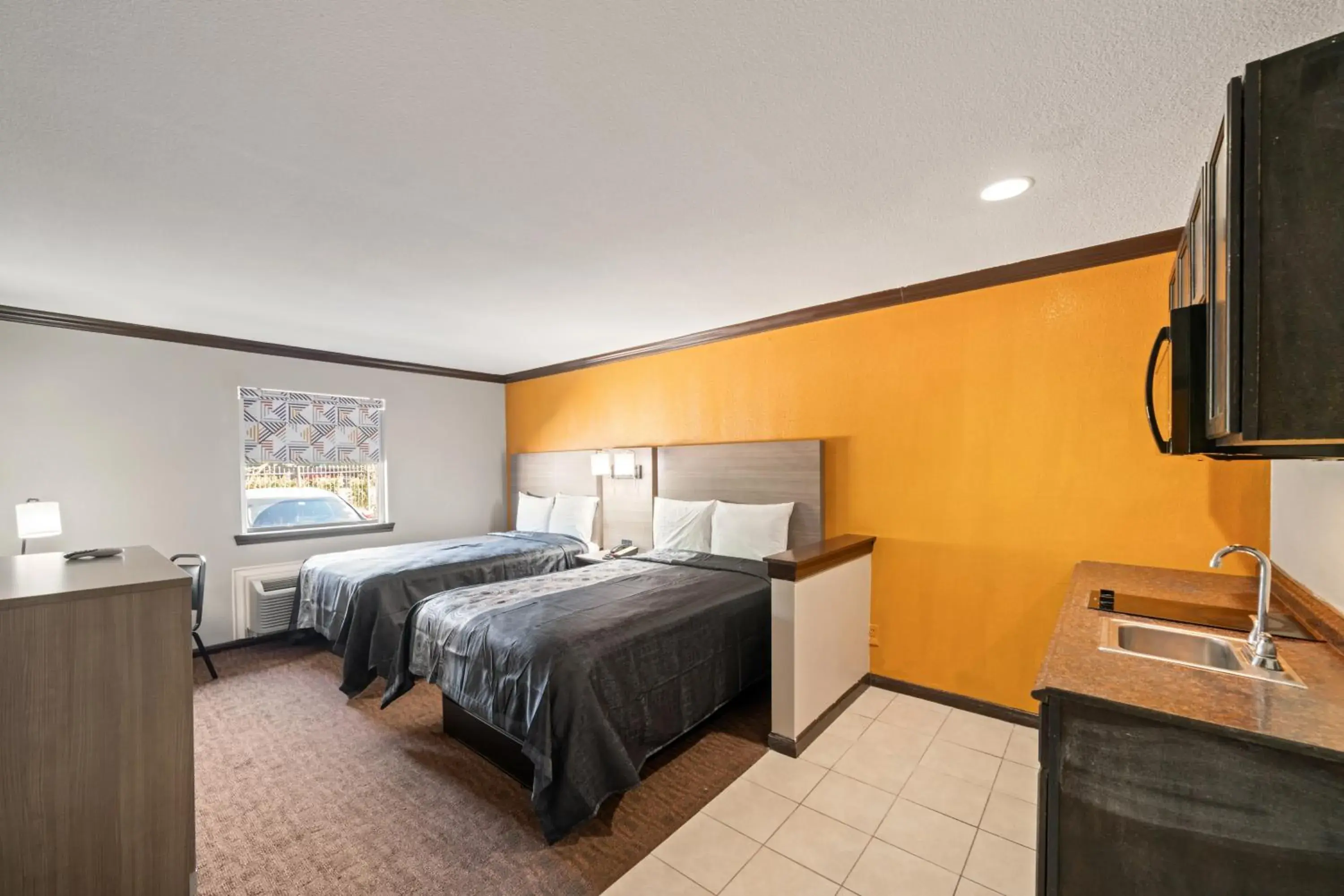 Bed in Americas Best Value Inn & Suites Brenham Bed in Americas Best Value Inn & Suites Brenham