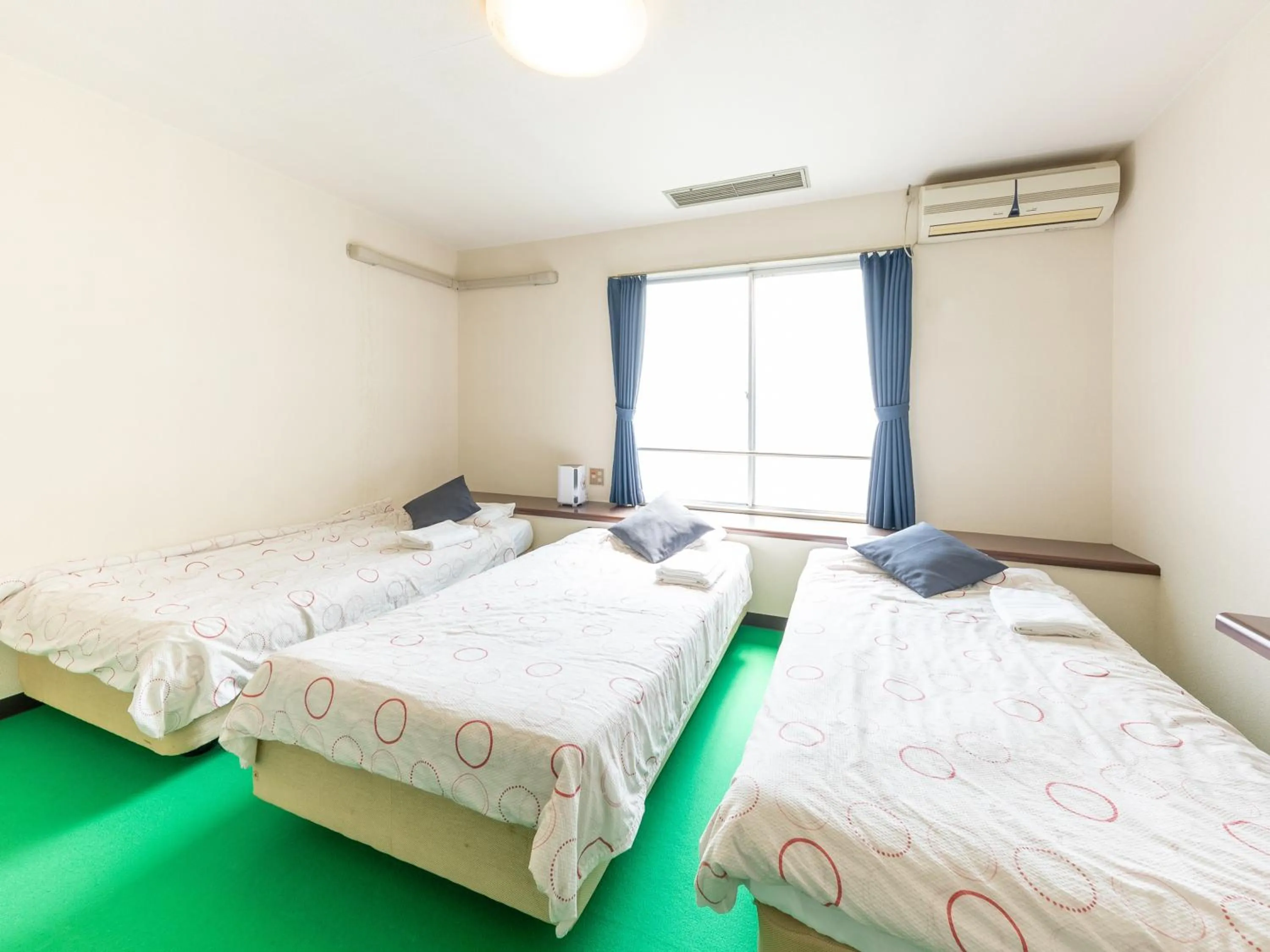 Bed in Tabist Business Hotel Chitose Kashiwazaki