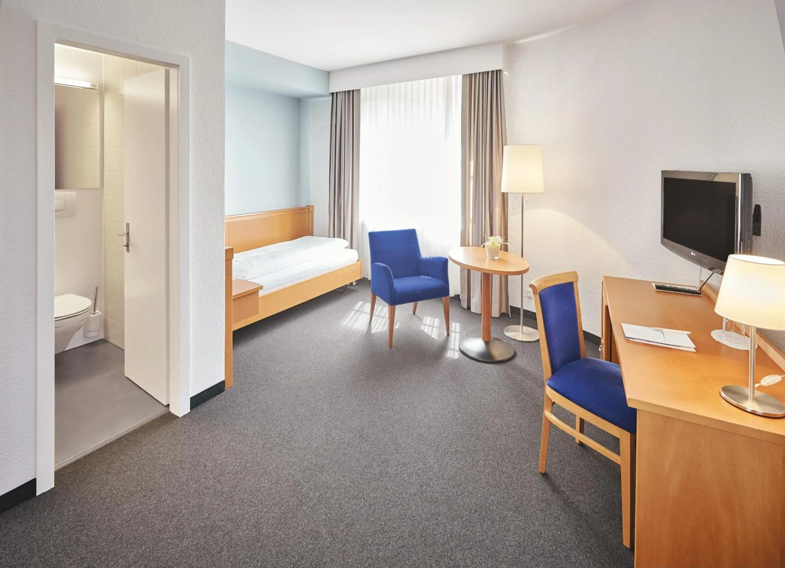 Bed in Hotel Schiff am Rhein