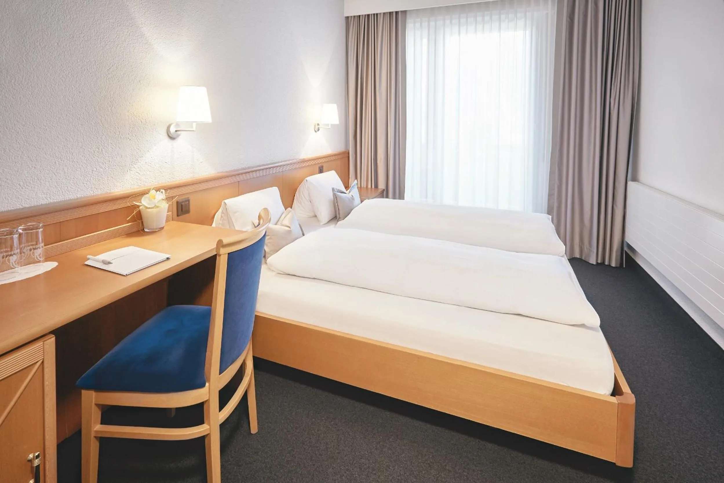 Bed in Hotel Schiff am Rhein