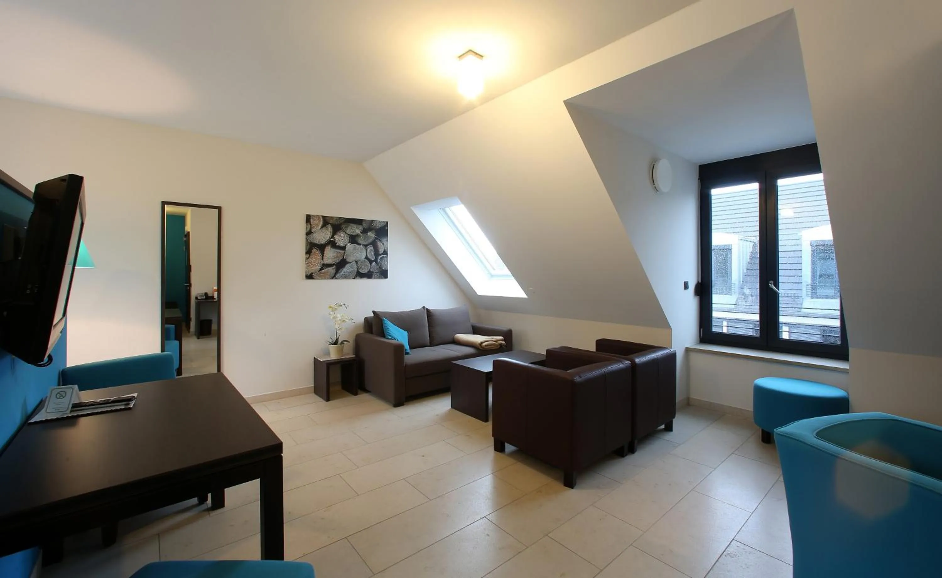 Seating area in KH Hotel mit Restaurant