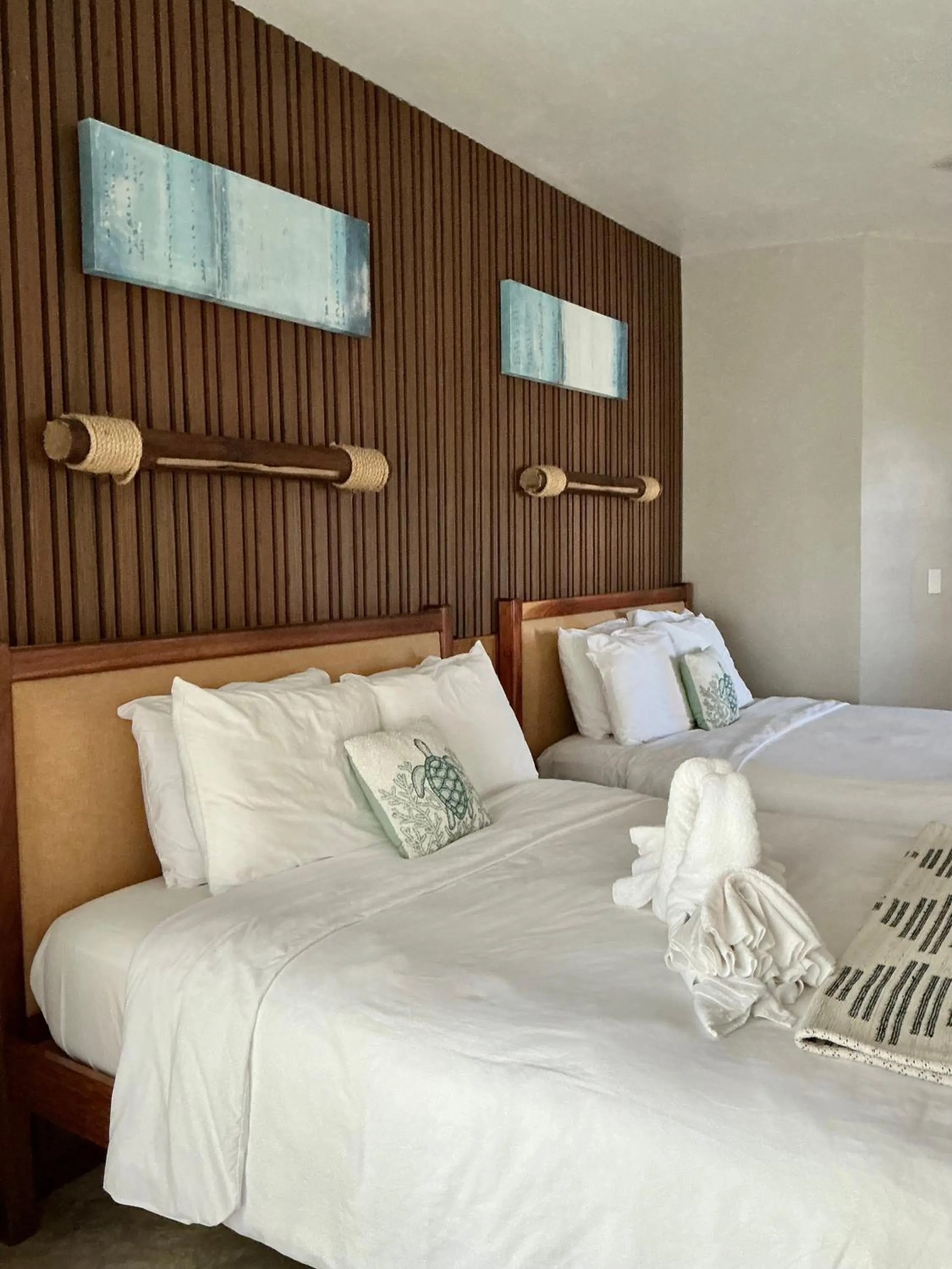 Bed in Mata Rocks Resort