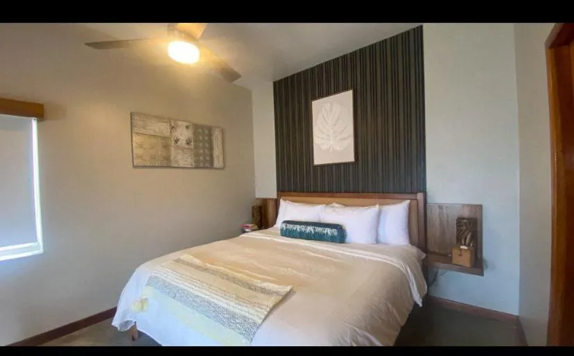 Bed in Mata Rocks Resort