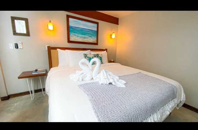 Bed in Mata Rocks Resort