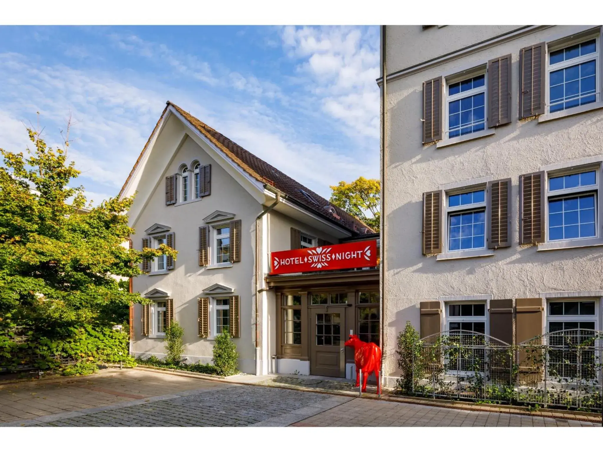Property building in Swiss Night by Fassbind Property building in Swiss Night by Fassbind