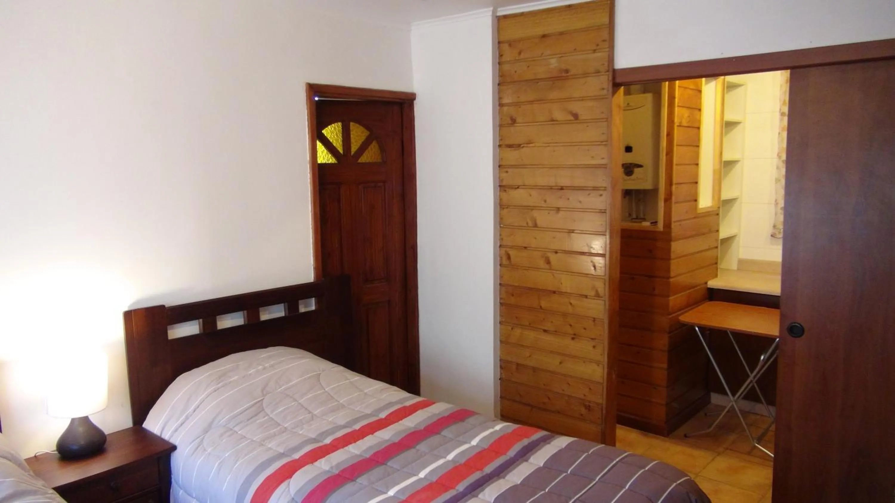 Bed in Hostal Los Avellanos