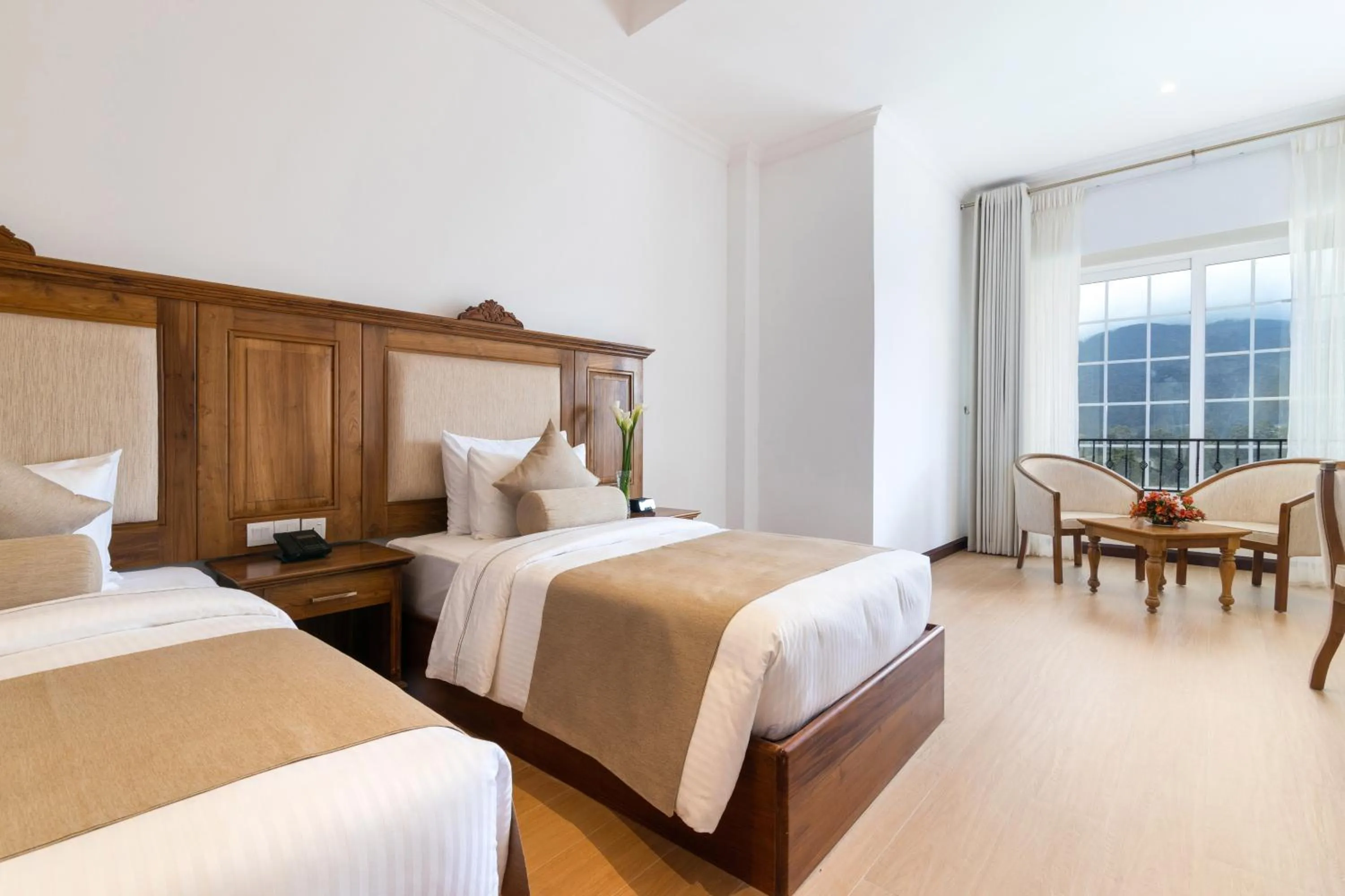 Bed in Araliya Red - Budget friendly Hotel- Where you find stunning 360 panoramic view of Nuwara Eliya