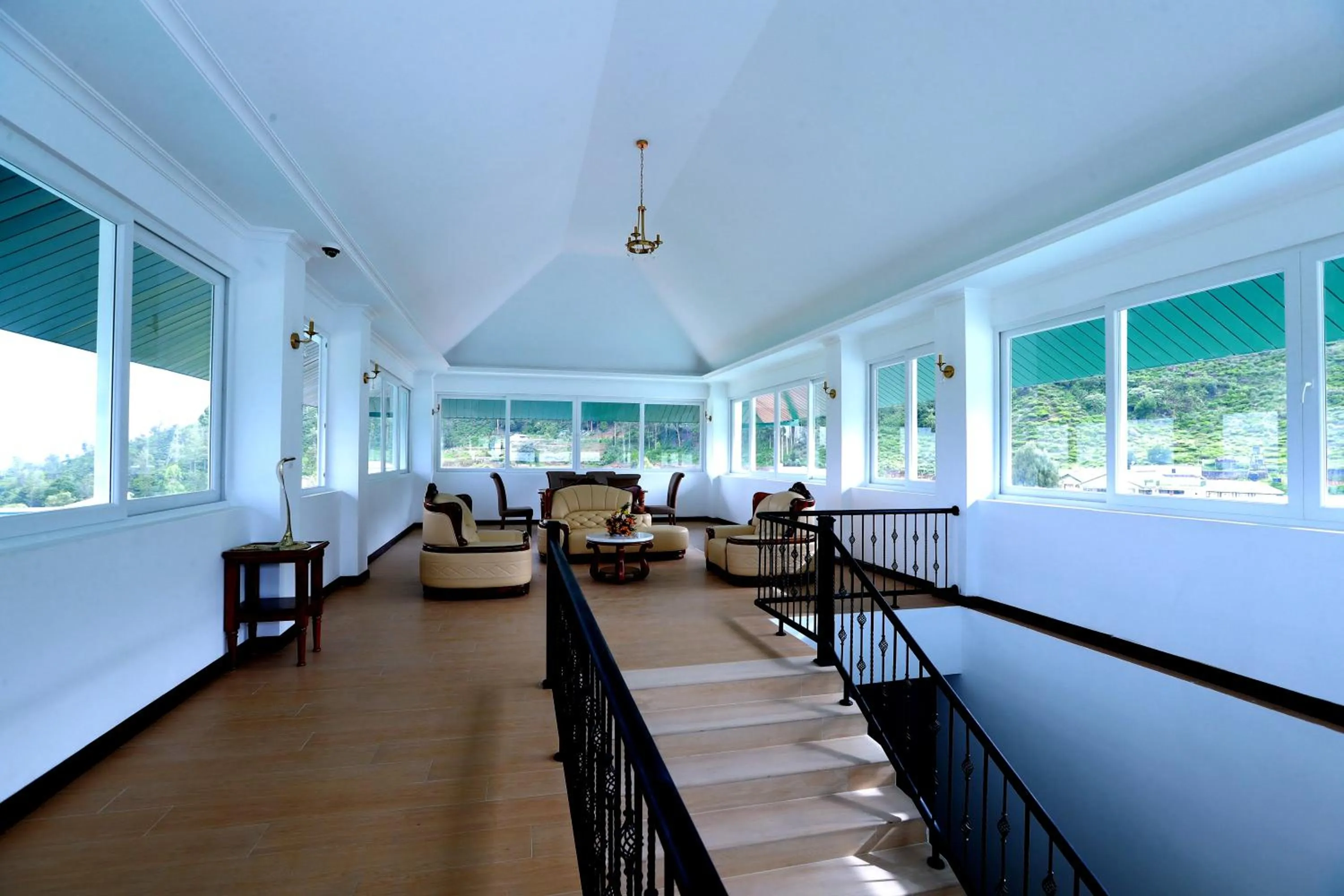 Lounge or bar in Araliya Red - Budget friendly Hotel- Where you find stunning 360 panoramic view of Nuwara Eliya