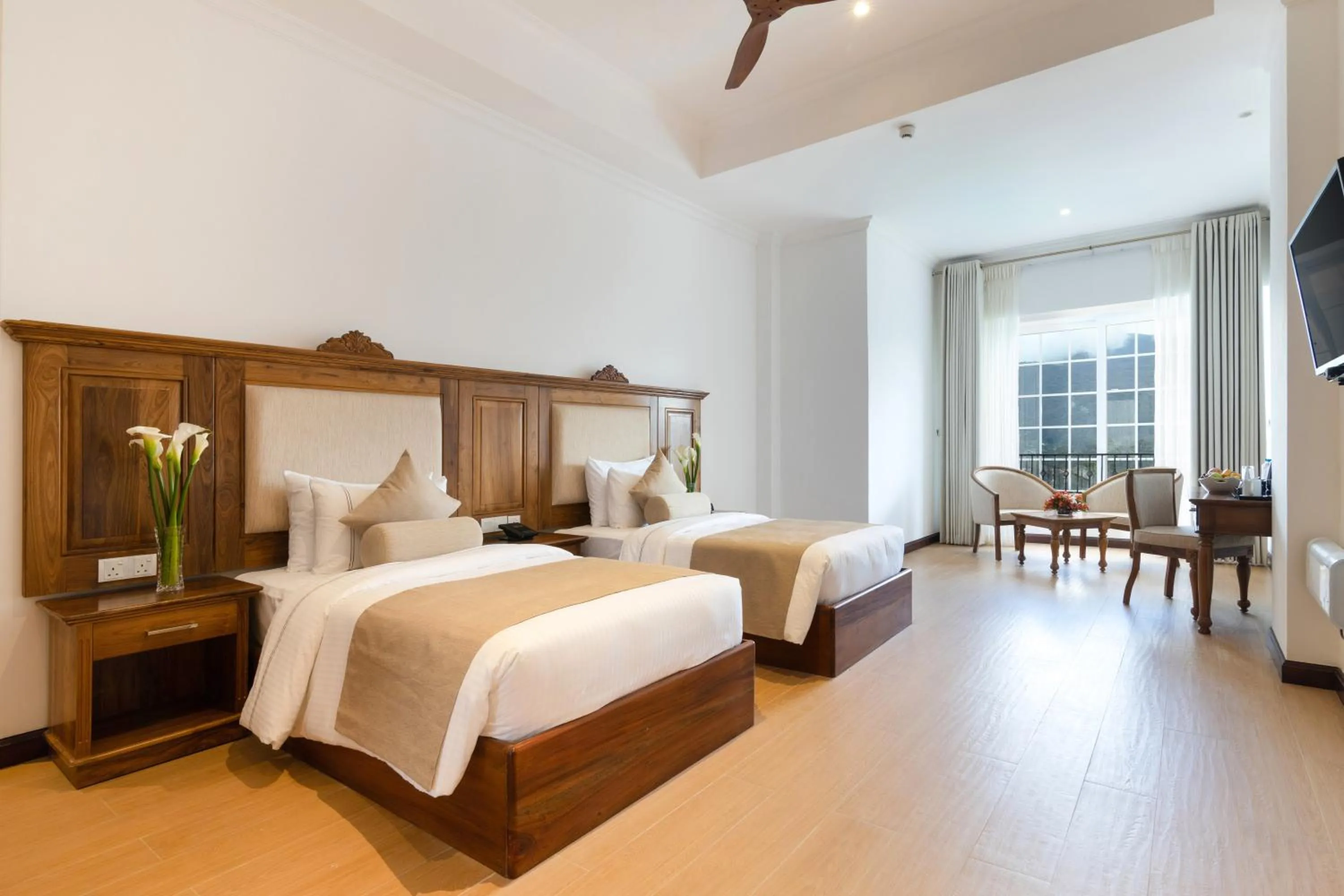 Bed in Araliya Red - Budget friendly Hotel- Where you find stunning 360 panoramic view of Nuwara Eliya