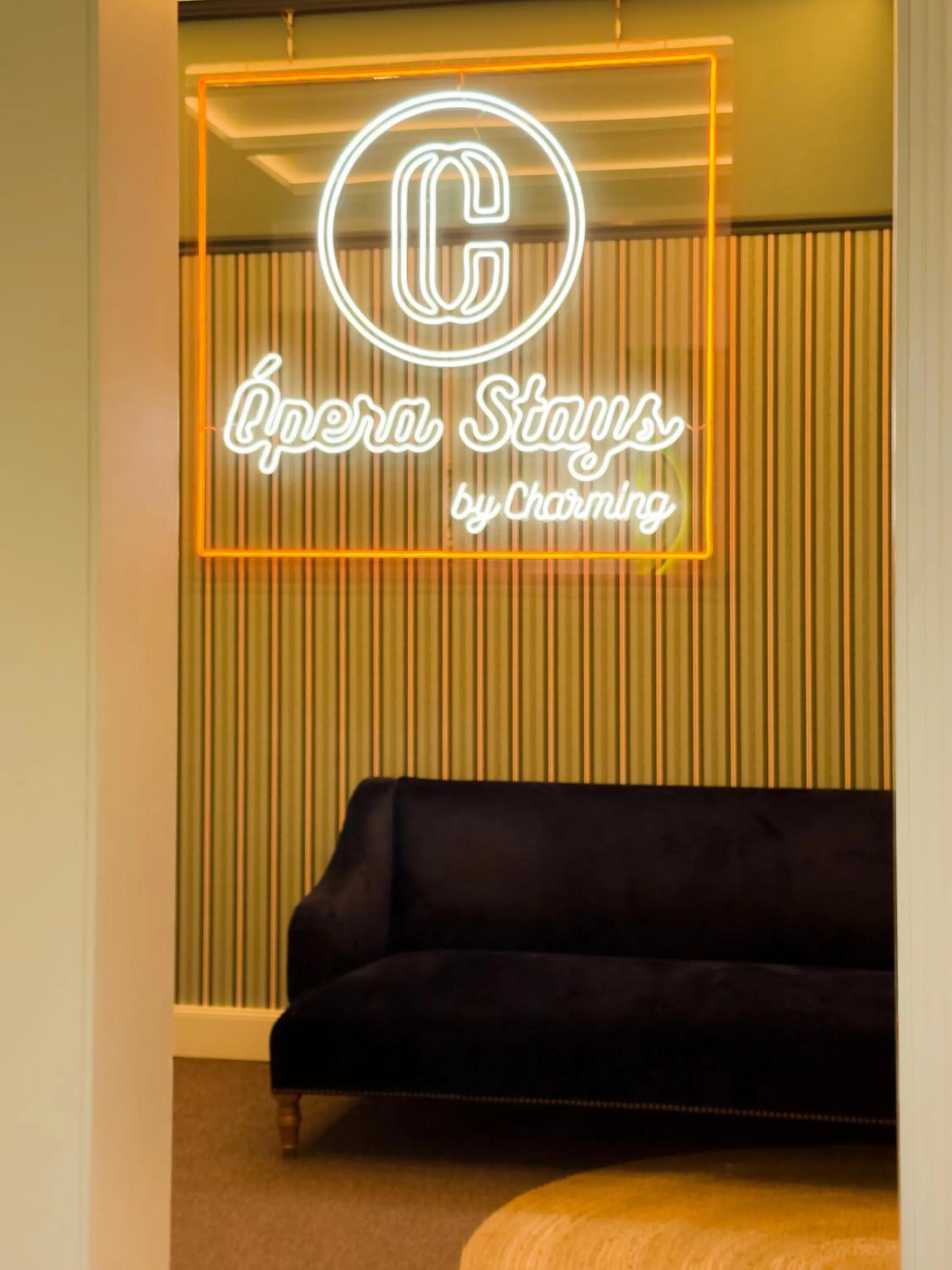 Property logo or sign in Ópera Stays by Charming