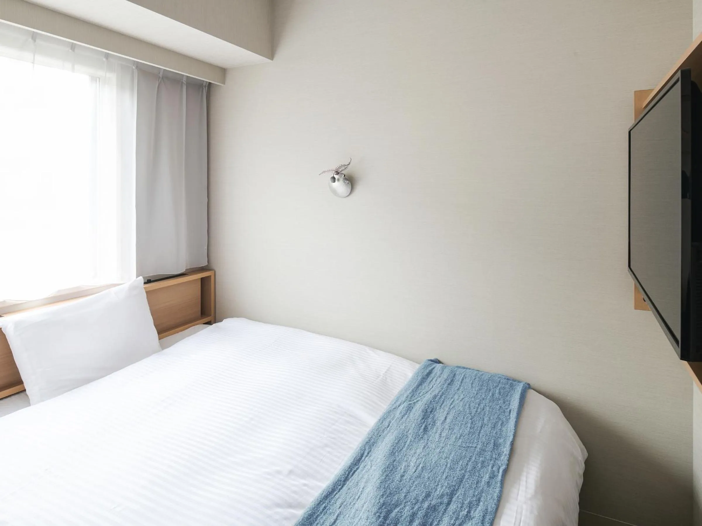 Photo of the whole room, Bed in REF Kyoto Hachijoguchi by VESSEL HOTELS