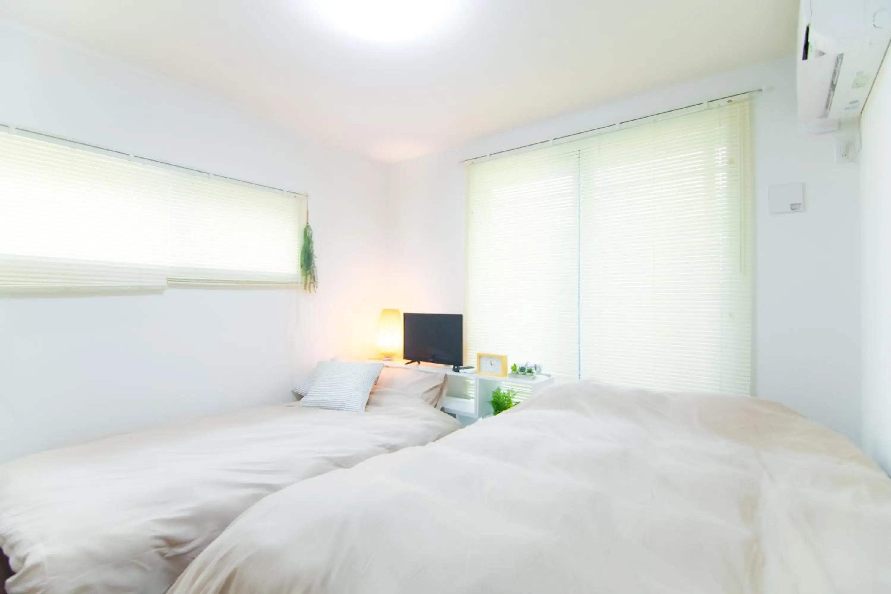 Bed in Base Hanegi Apartment Bed in Base Hanegi Apartment