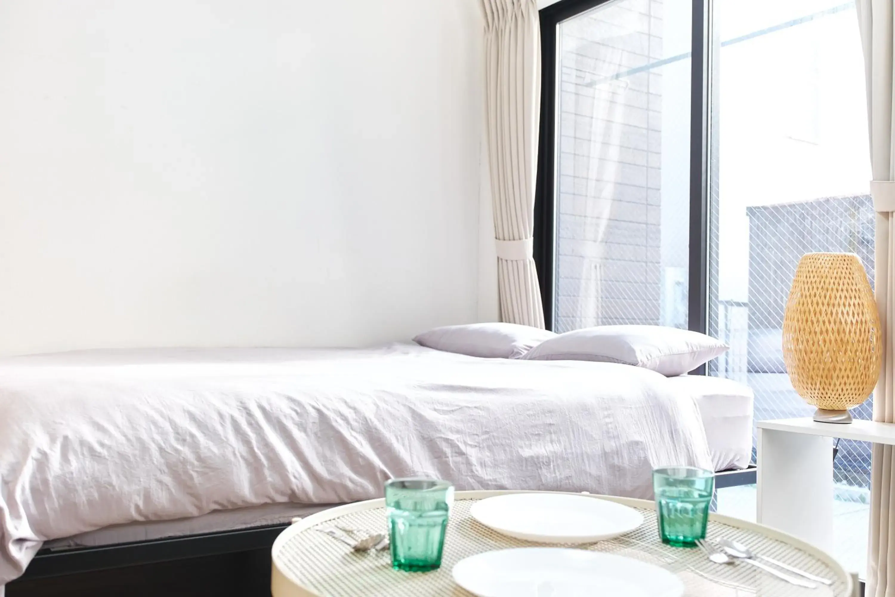 Bed in Base Hanegi Apartment by Tranova Bed in Base Hanegi Apartment by Tranova