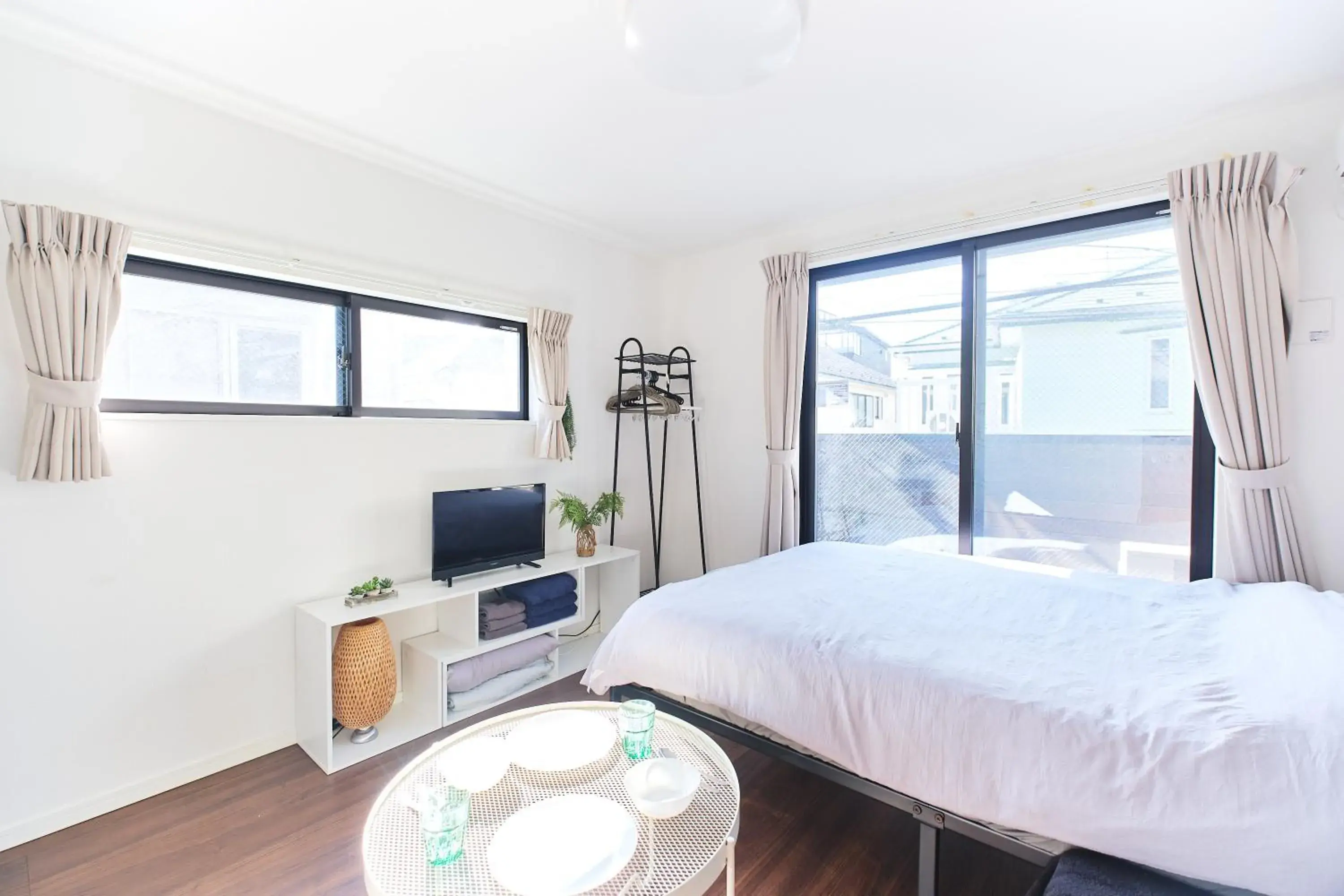 Bed in Base Hanegi Apartment by Tranova Bed in Base Hanegi Apartment by Tranova