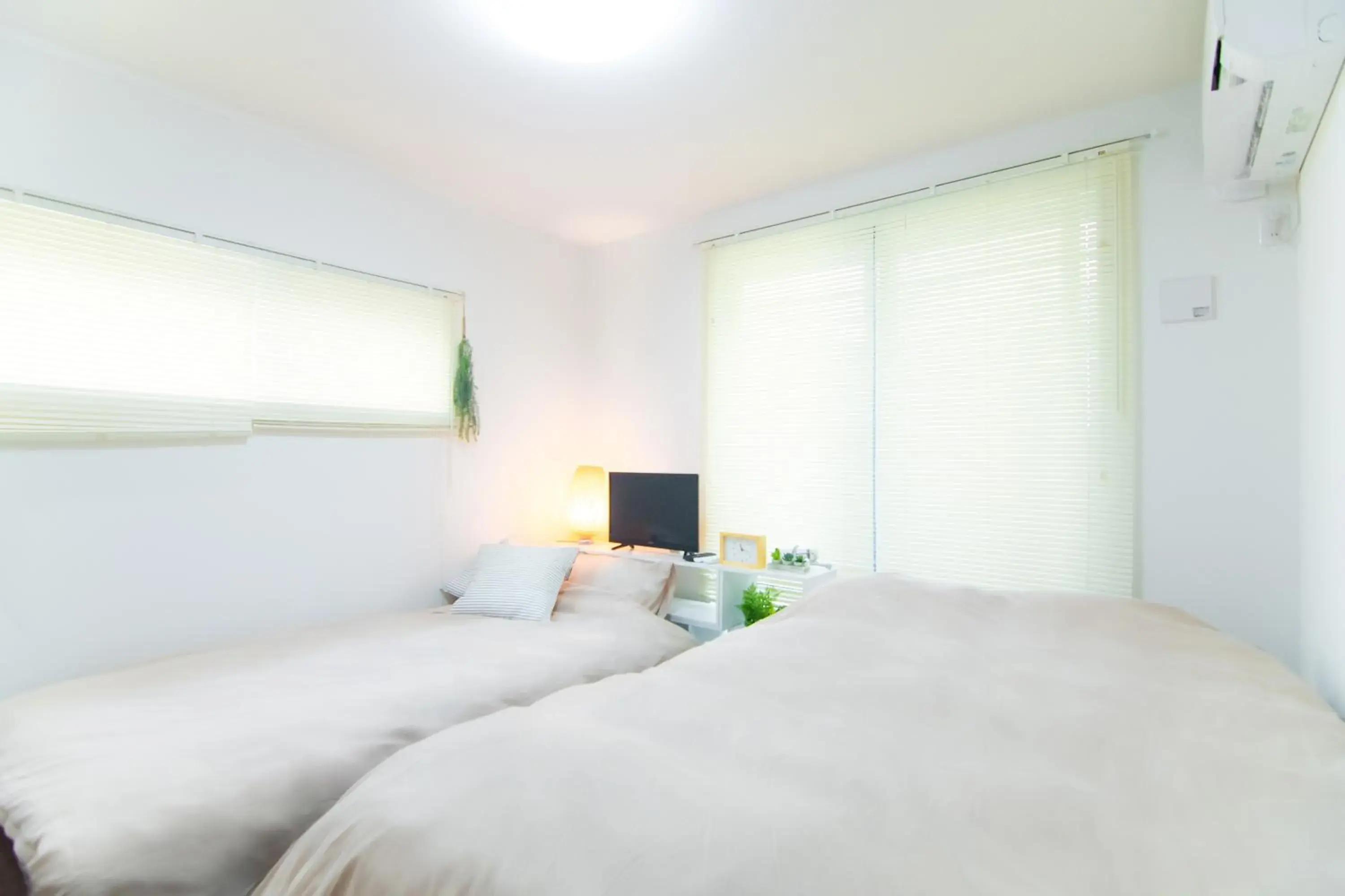 Bed in Base Hanegi Apartment Bed in Base Hanegi Apartment