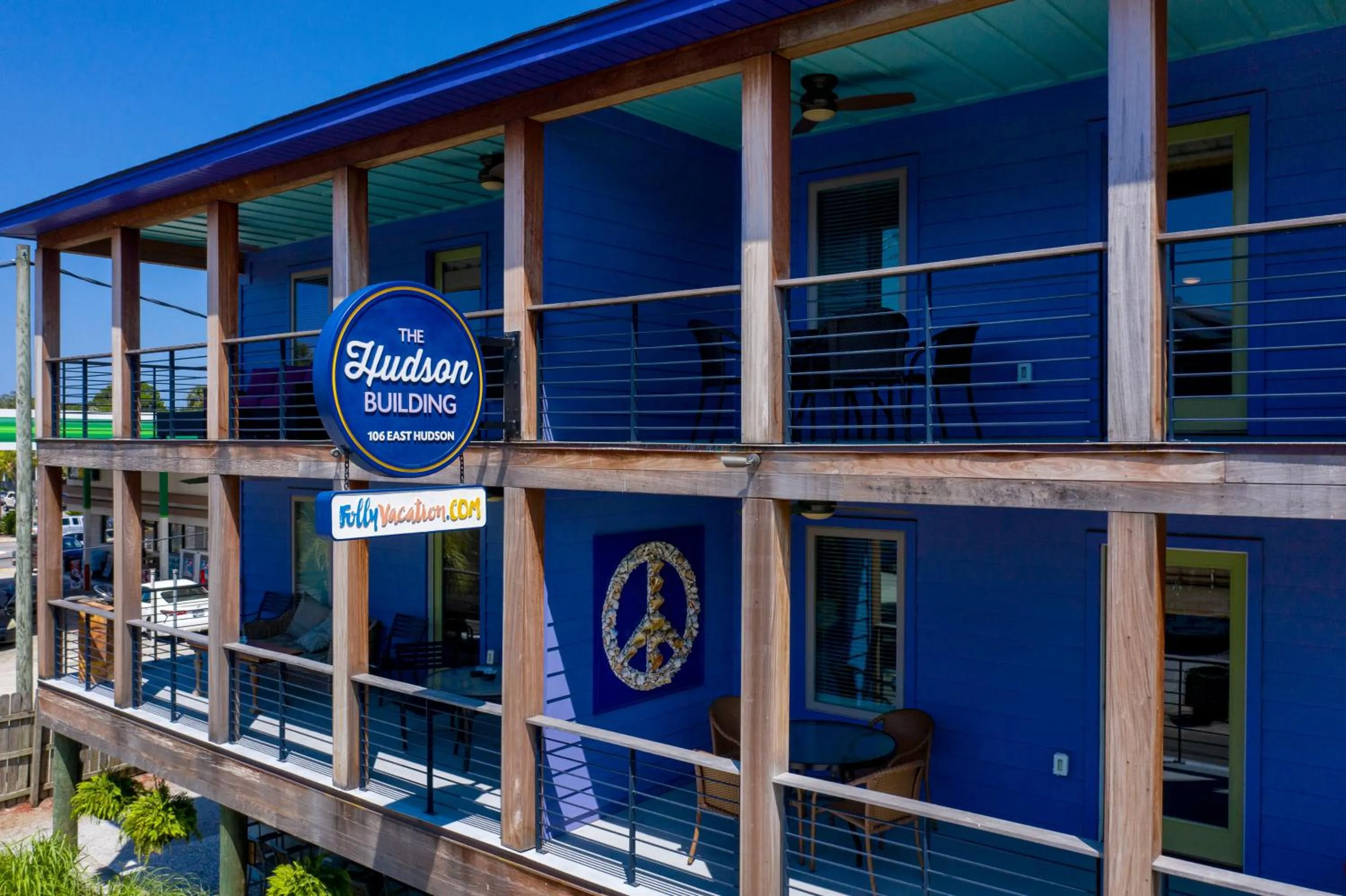 Property logo or sign in Folly Vacation Great Location, Super Cute & Spacious Apt B