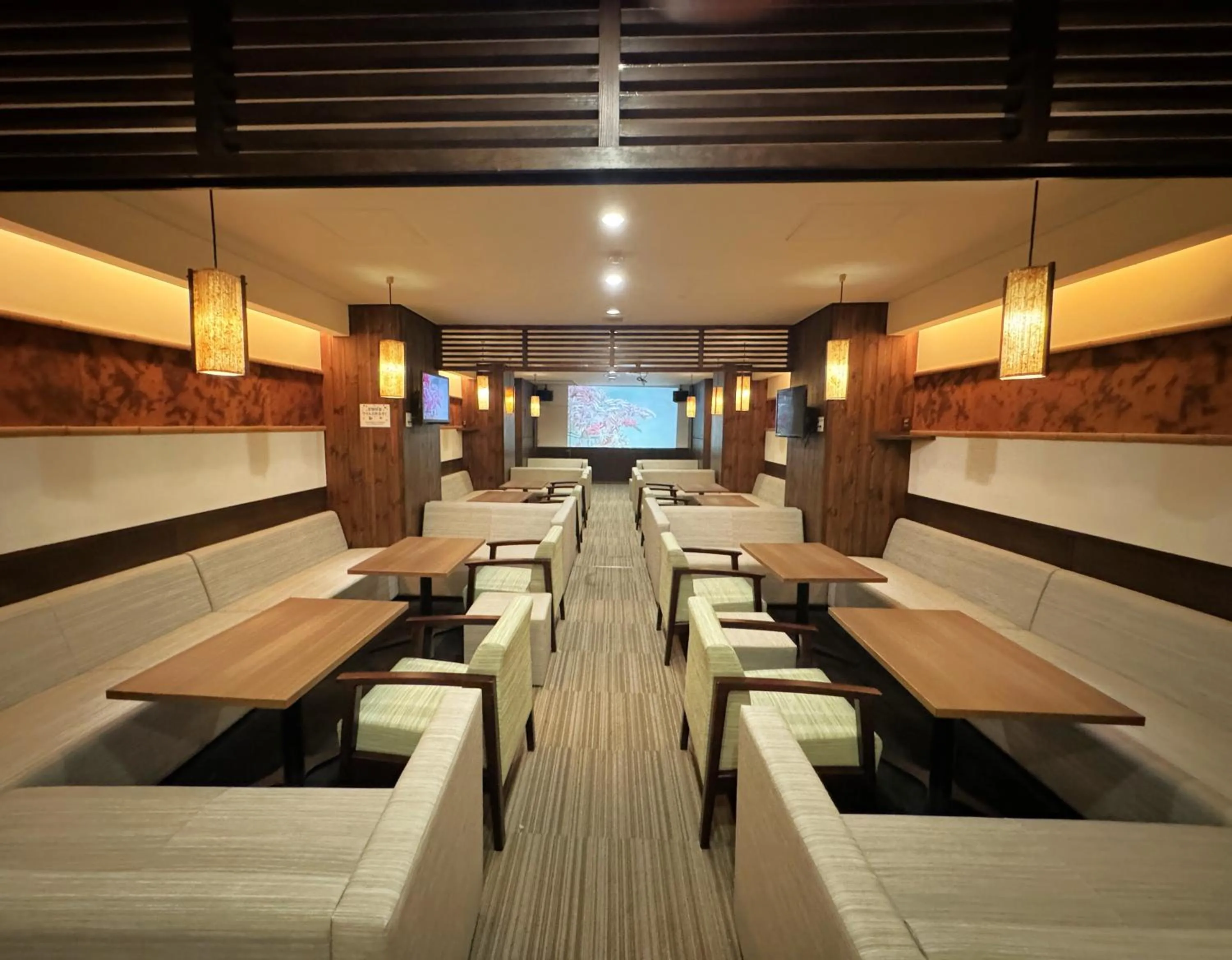 Communal lounge/ TV room in Yorokobinoyado Takamatsu