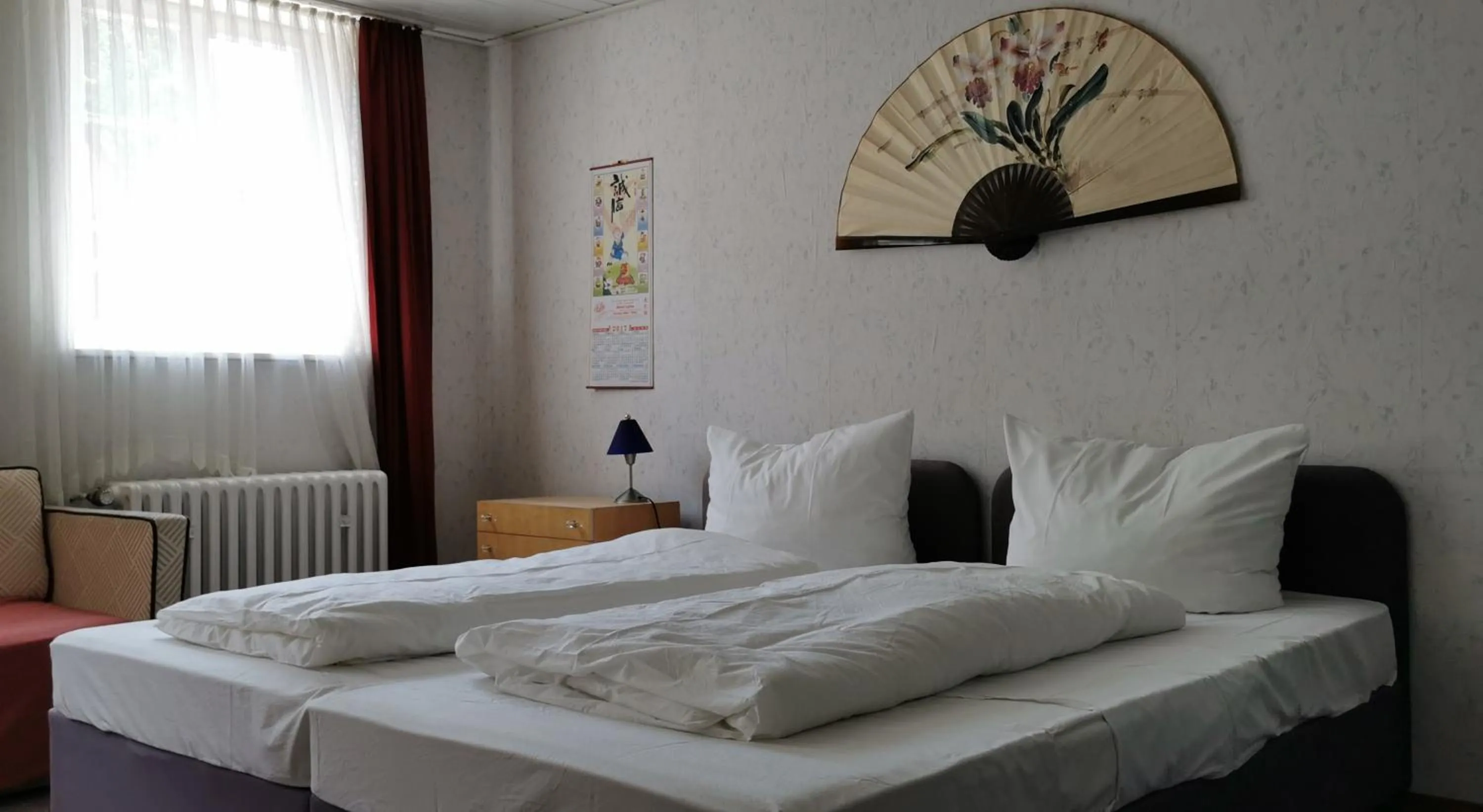 Bed in China Restaurant Hotel Lotus