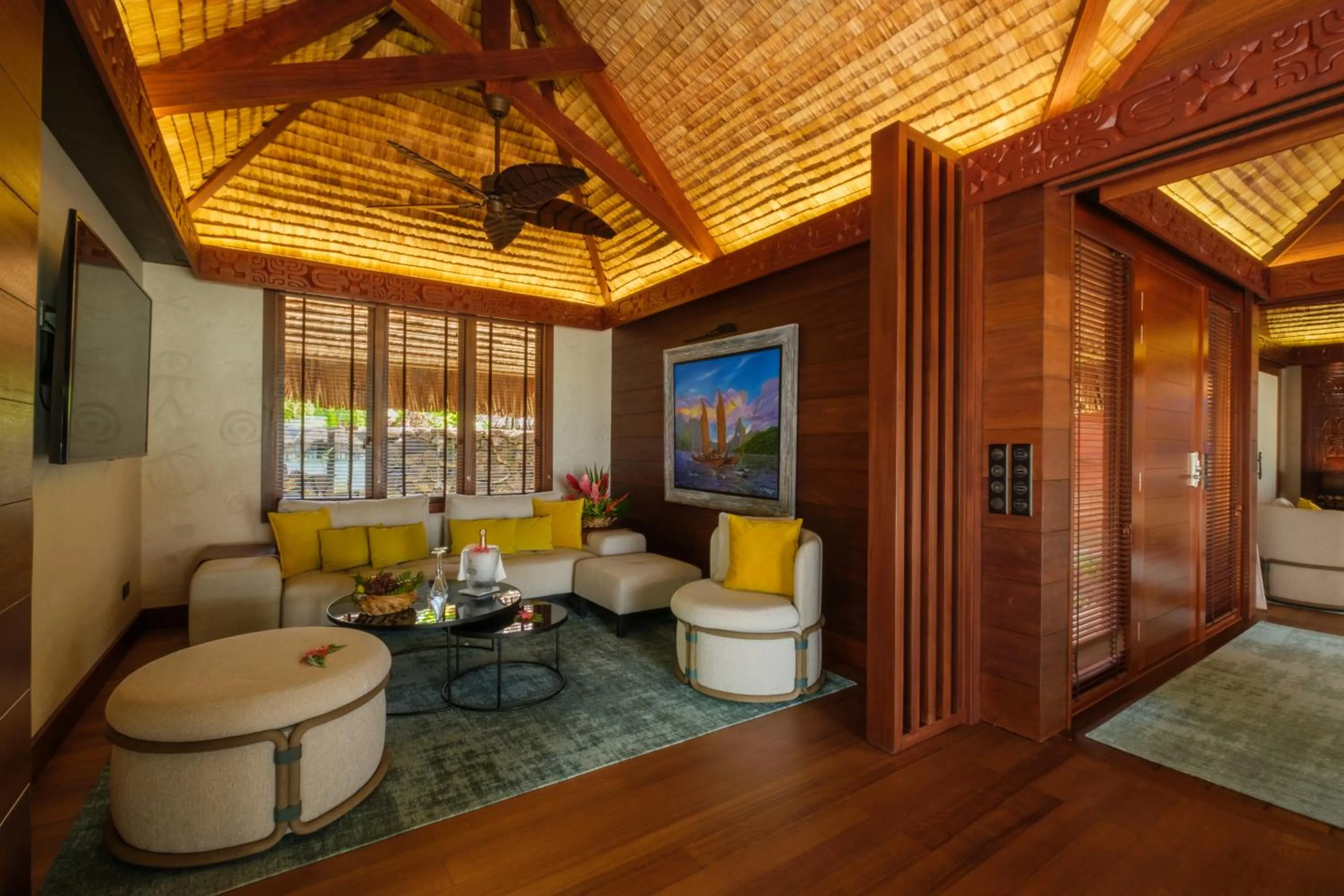 Living room in Le Taha'a by Pearl Resorts
