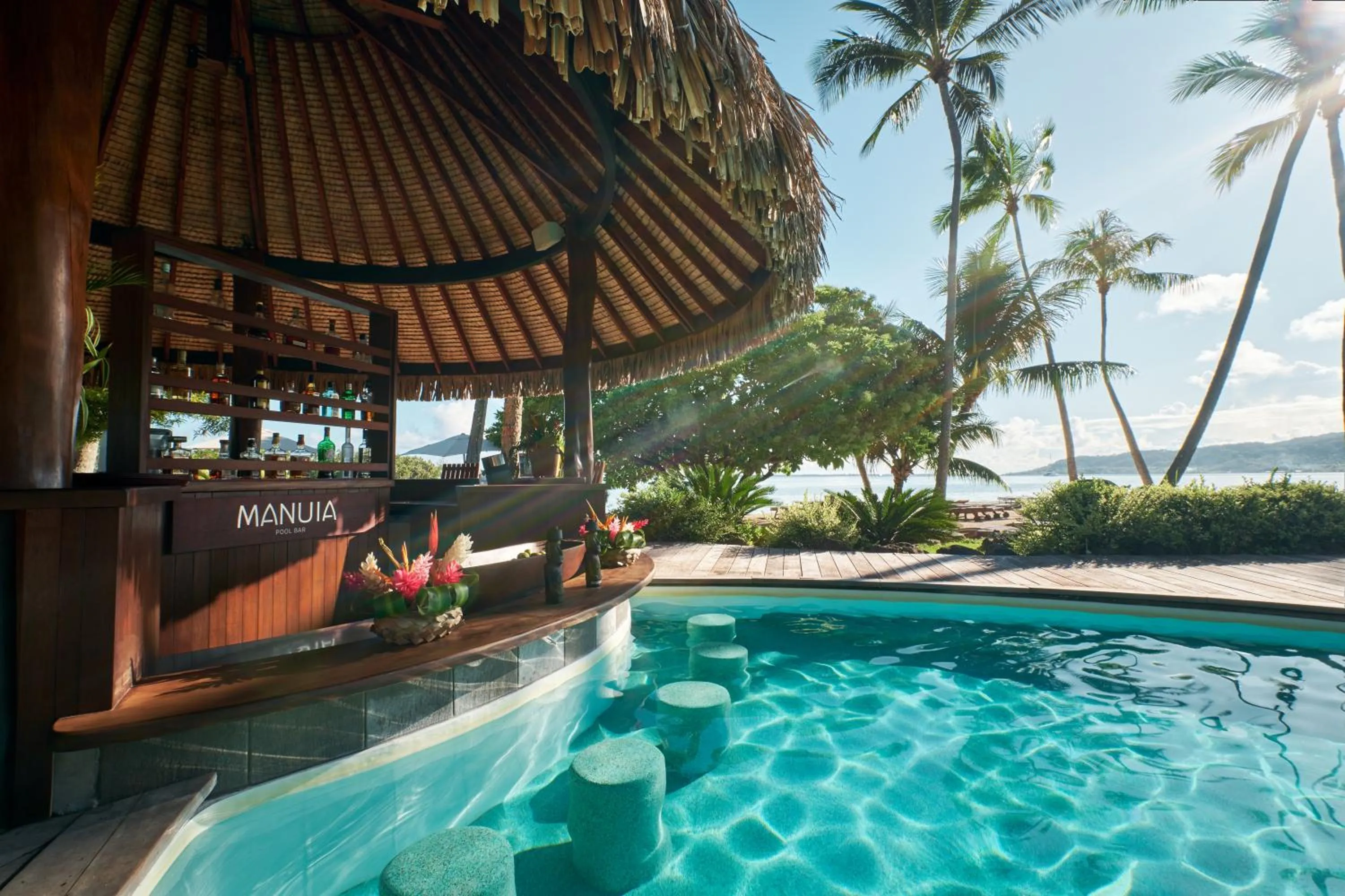 Lounge or bar in Le Taha'a by Pearl Resorts