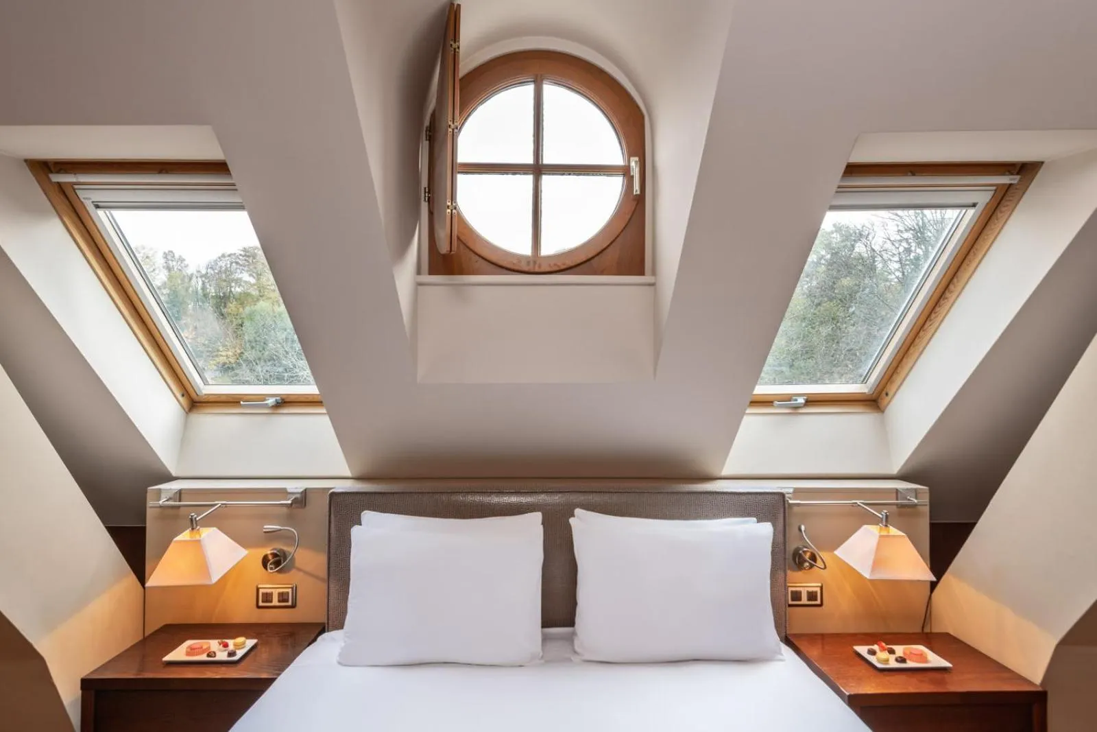 Bed in Hôtel Résidence Parc des Eaux Vives