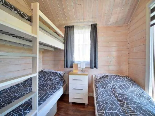 Bed in Domki Letniskowe Do-Iwi