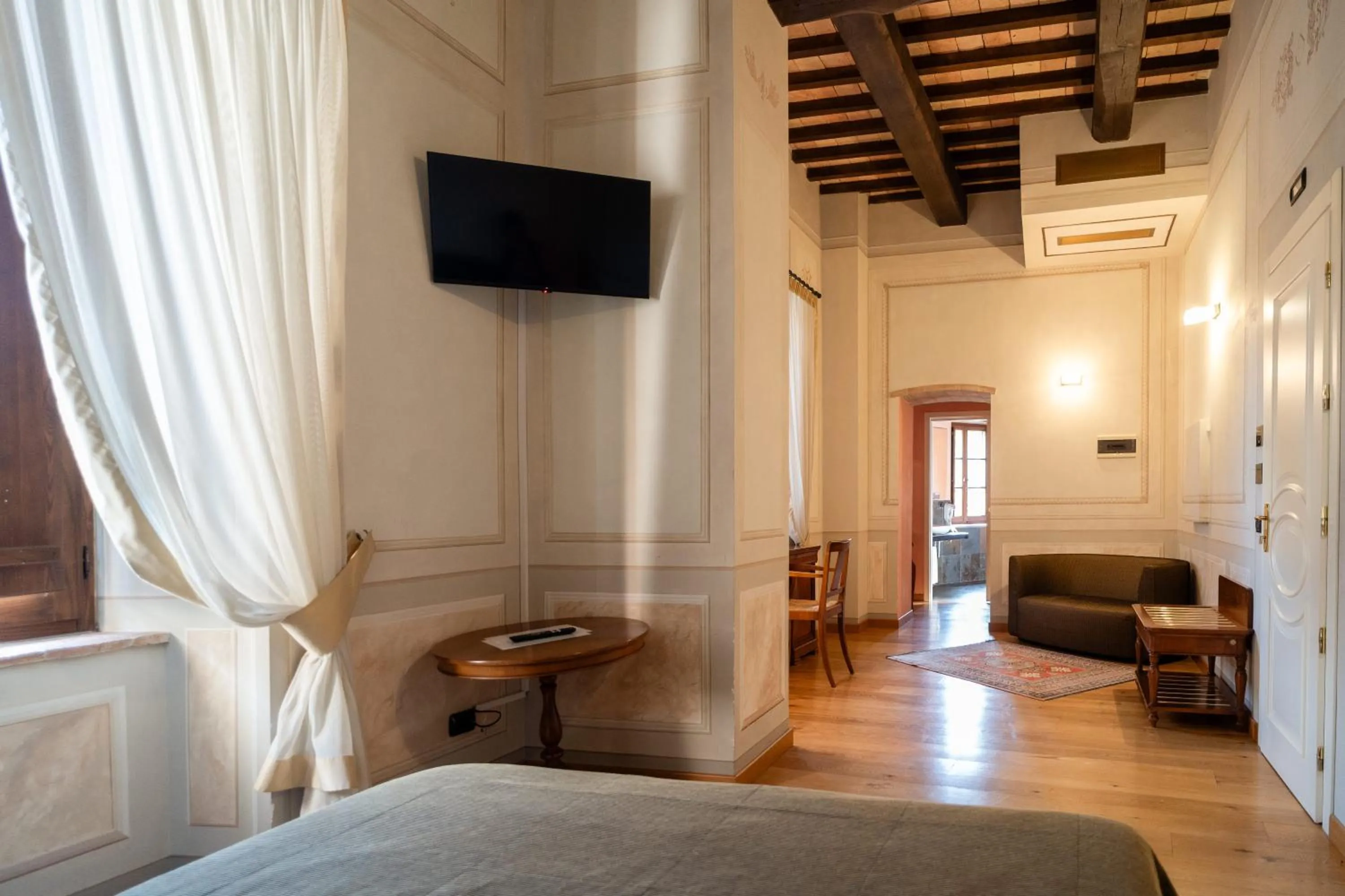 Photo of the whole room, Bed in Castello di Baccaresca