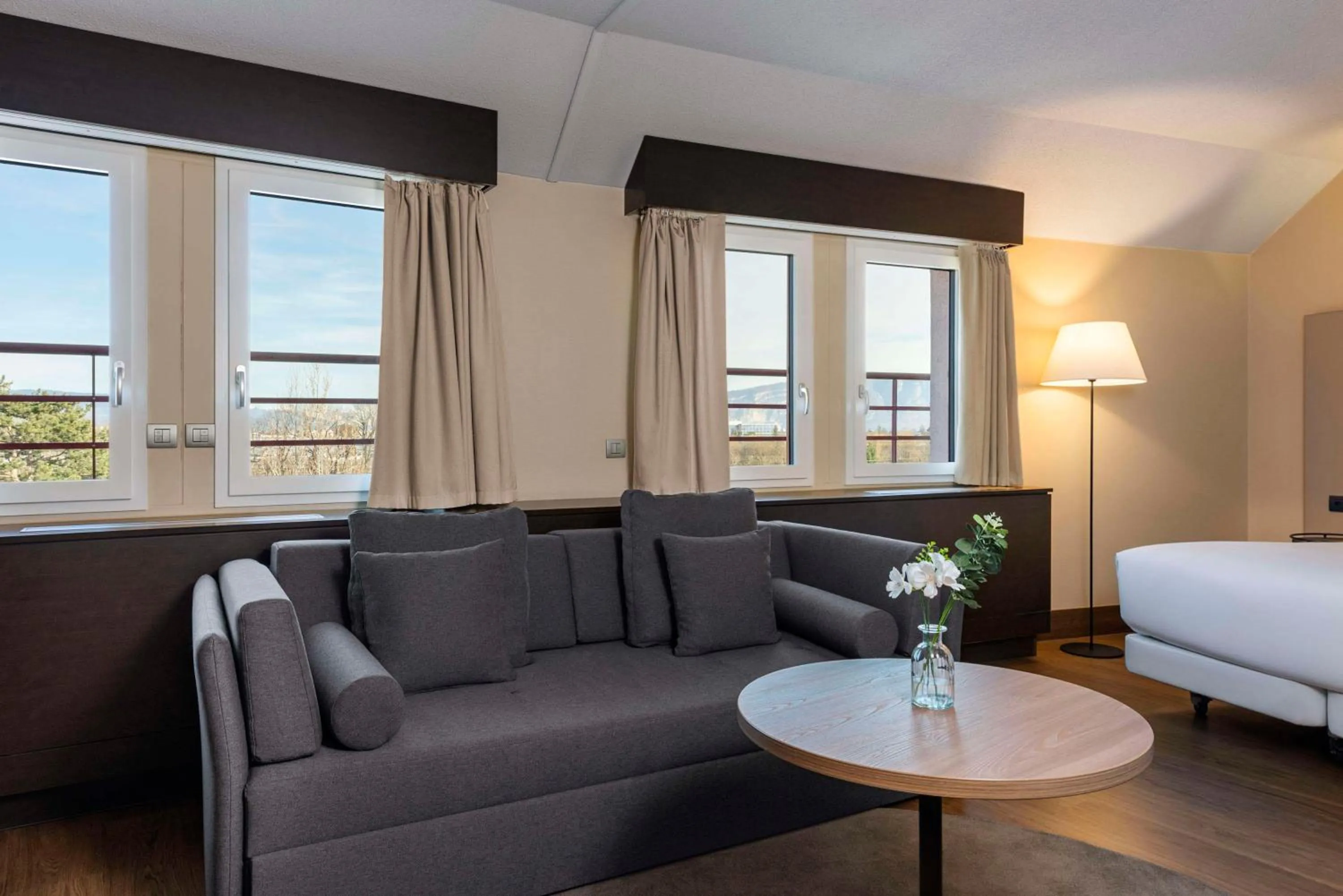 Photo of the whole room, Bed in NH Geneva Airport Hotel