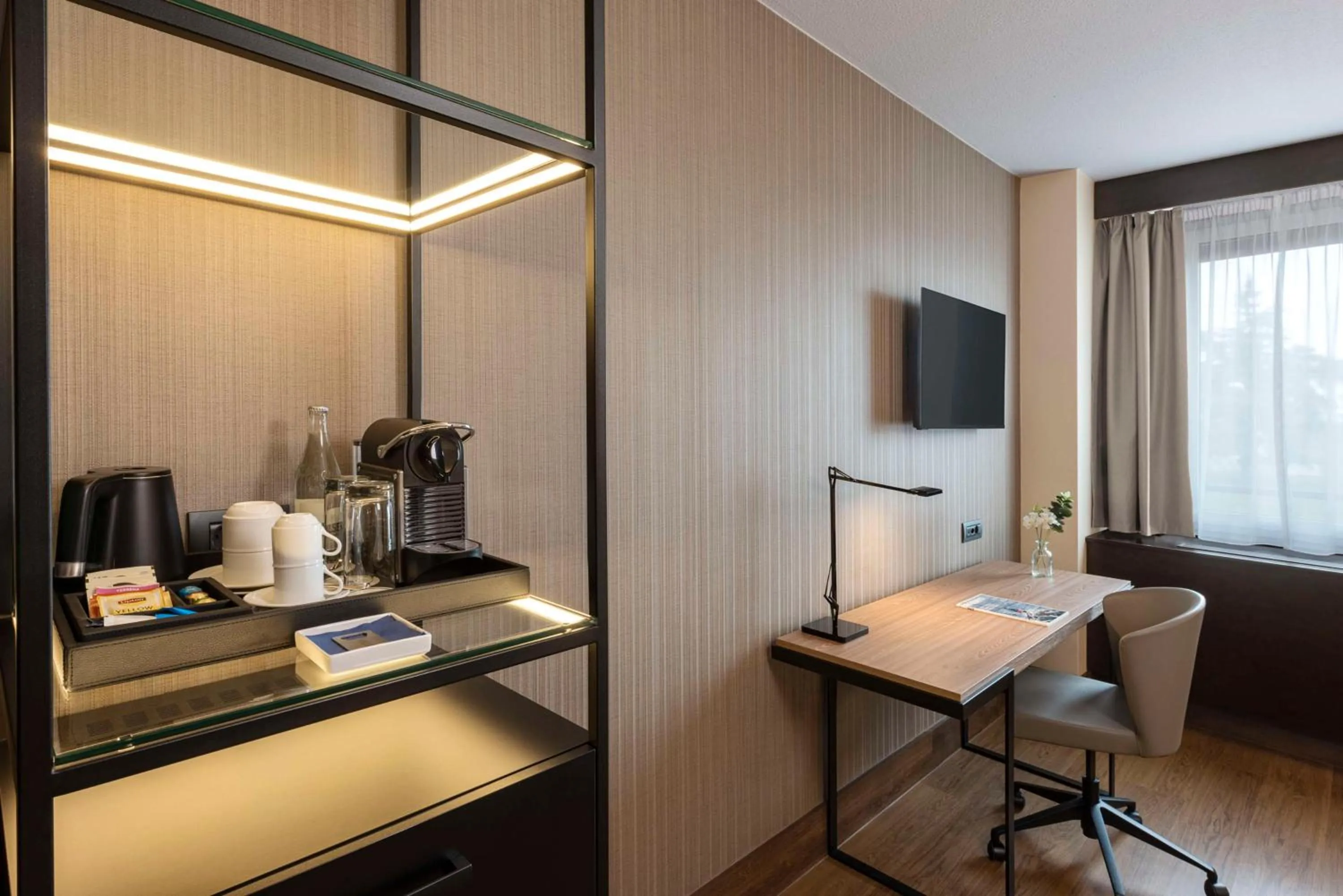 Bedroom in NH Geneva Airport Hotel