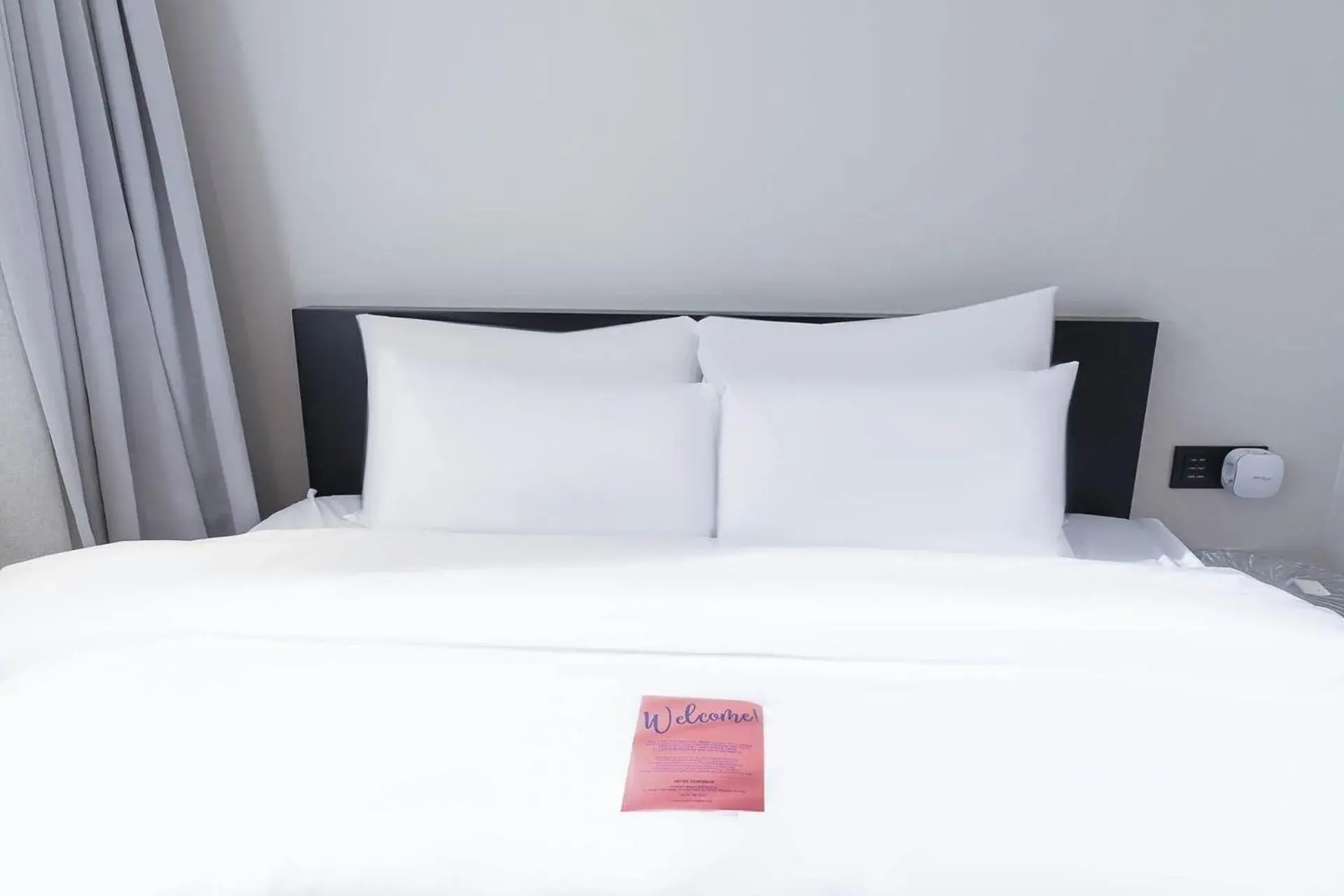 Bed in Hotel Hongdan Bed in Hotel Hongdan