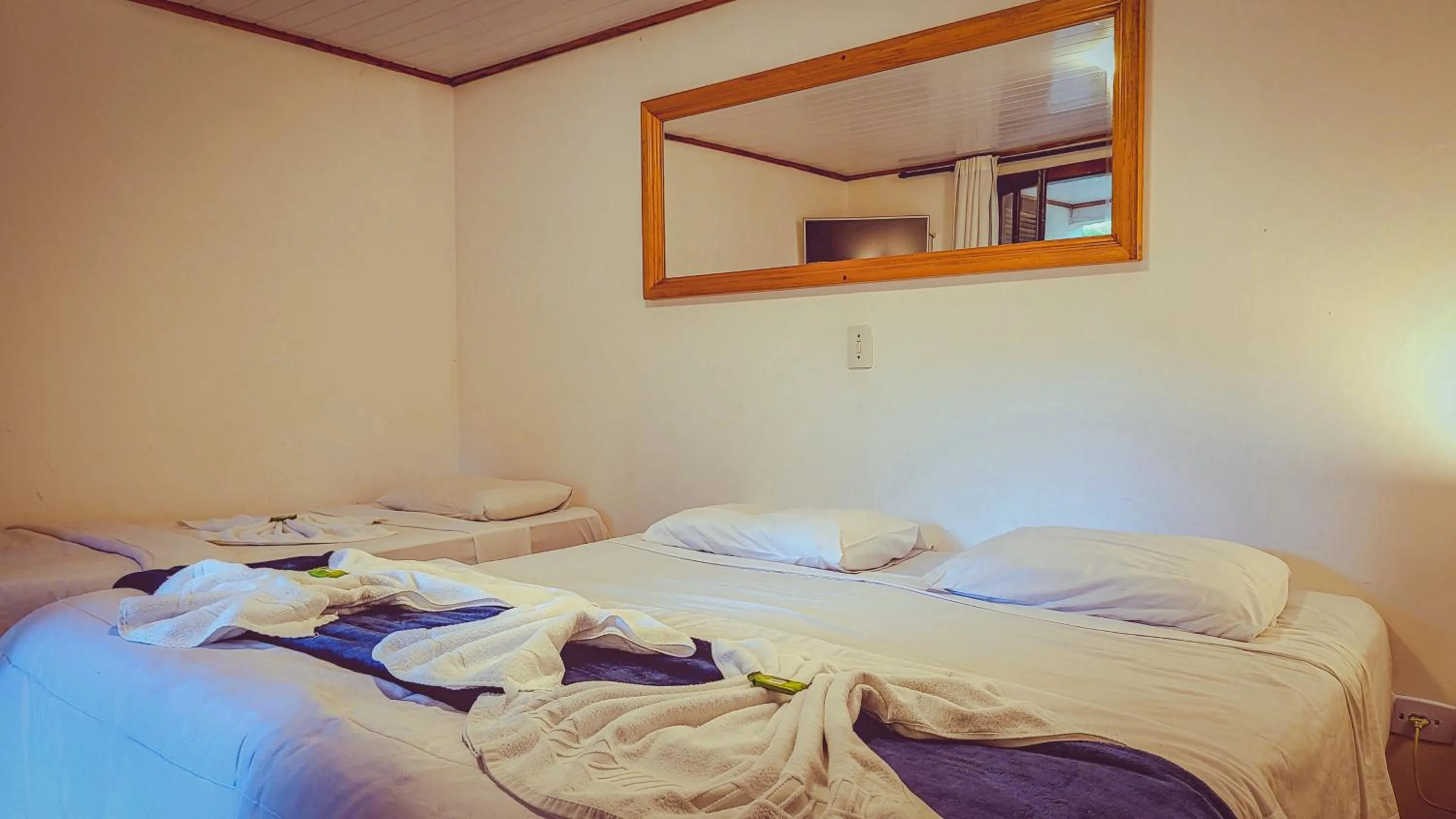 Bed in Pousada Atalaia Capivari