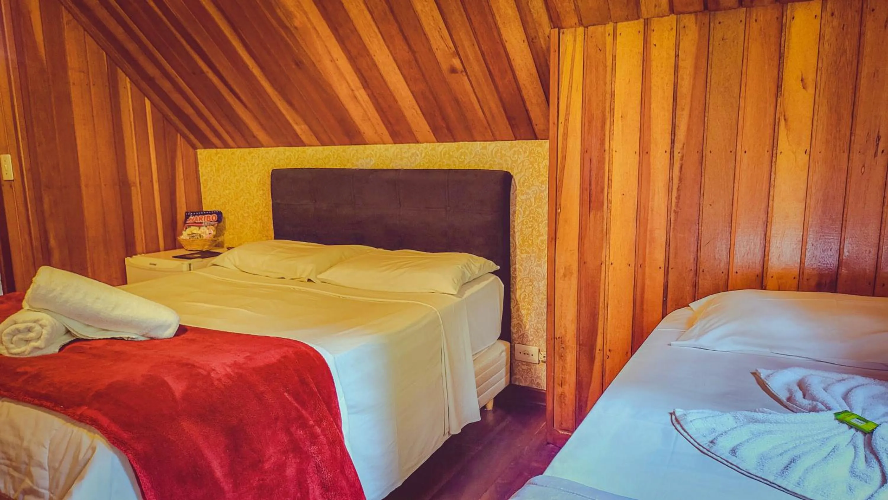 Bed in Pousada Atalaia Capivari