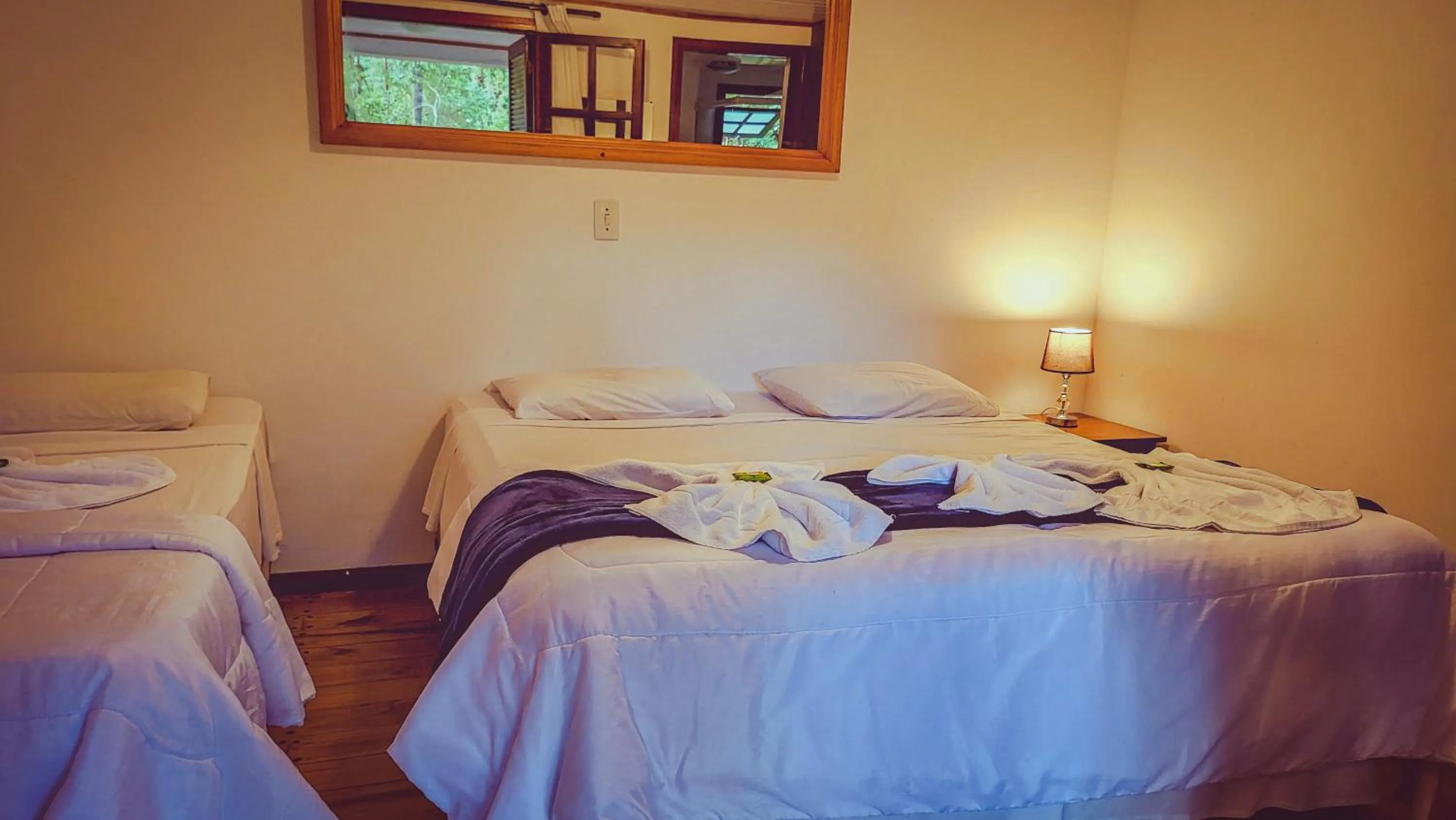 Bed in Pousada Atalaia Capivari