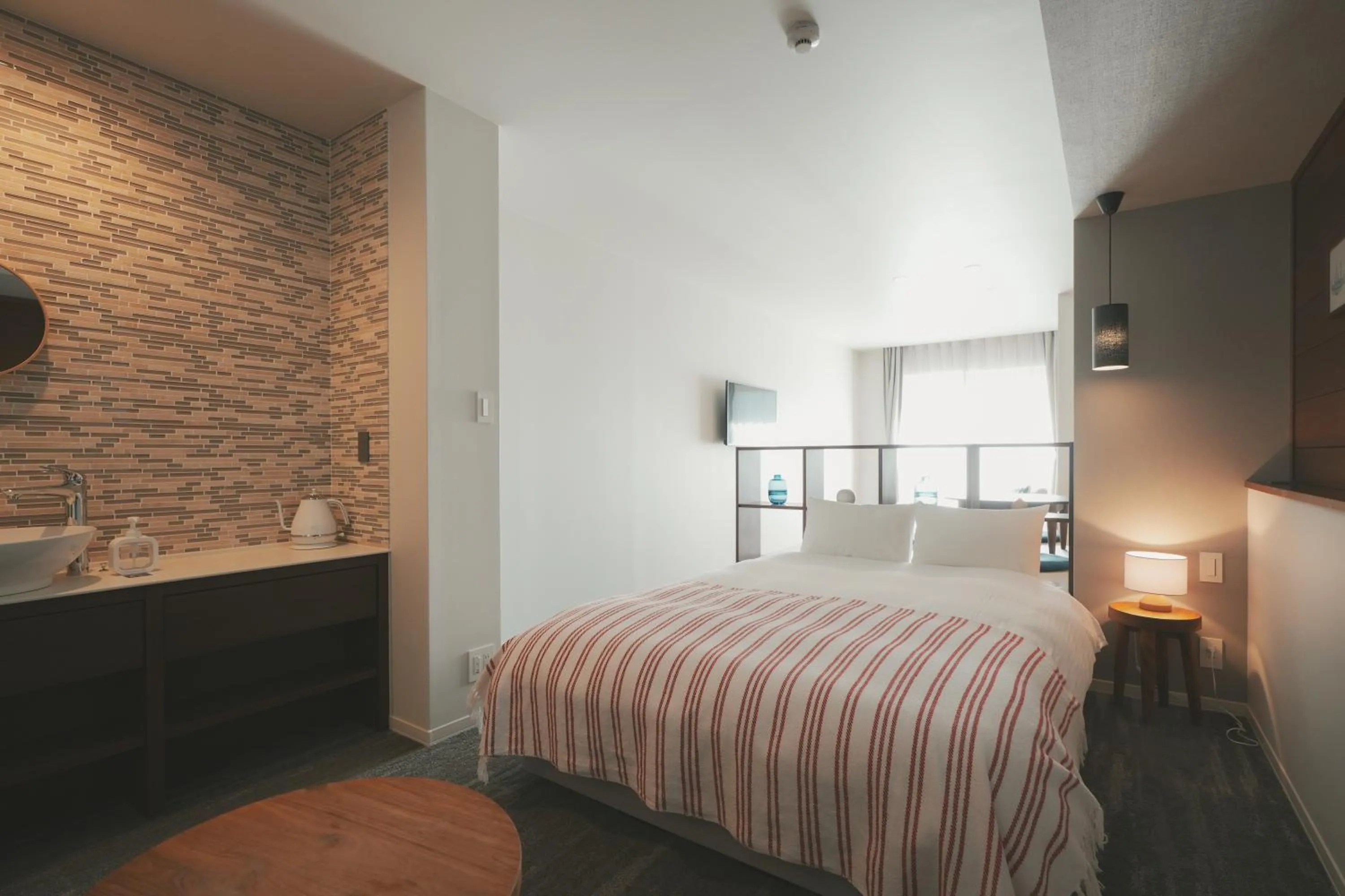 Bed in LAZULI Hiroshima Hotel and Lounge