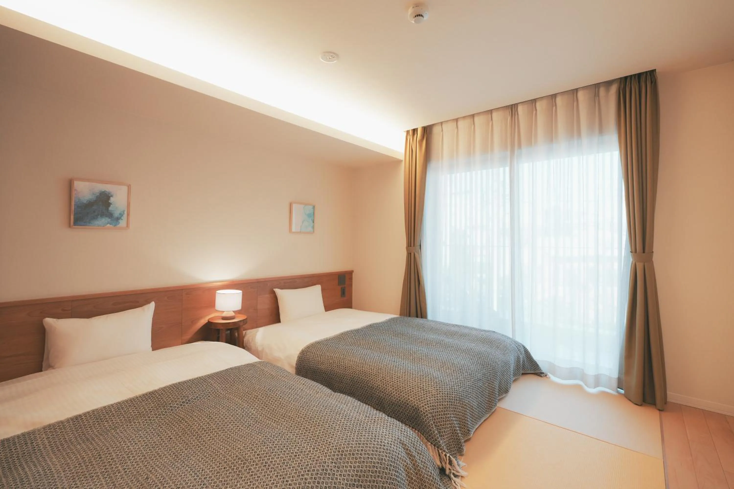 Bed in LAZULI Hiroshima Hotel and Lounge